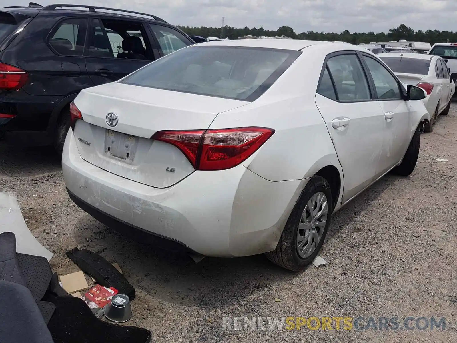 4 Photograph of a damaged car 5YFBURHE2KP864669 TOYOTA COROLLA 2019