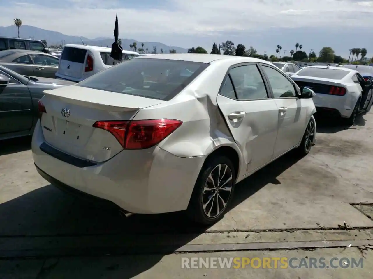 4 Photograph of a damaged car 5YFBURHE2KP868849 TOYOTA COROLLA 2019