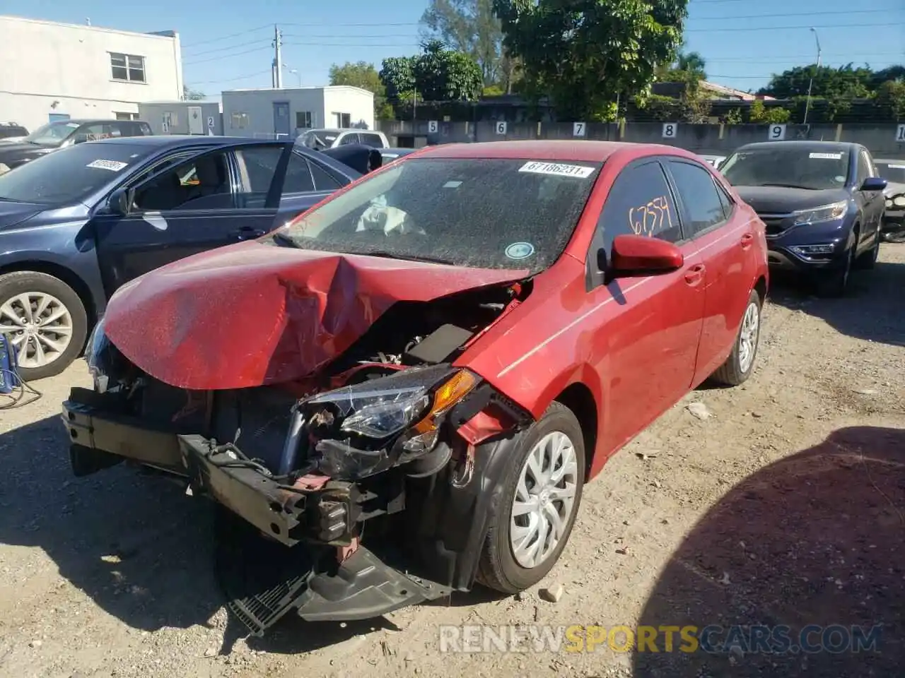 2 Photograph of a damaged car 5YFBURHE2KP875946 TOYOTA COROLLA 2019