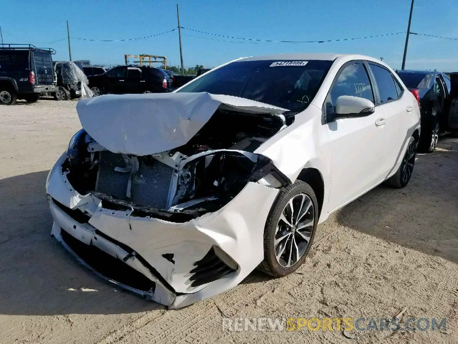 2 Photograph of a damaged car 5YFBURHE2KP885571 TOYOTA COROLLA 2019
