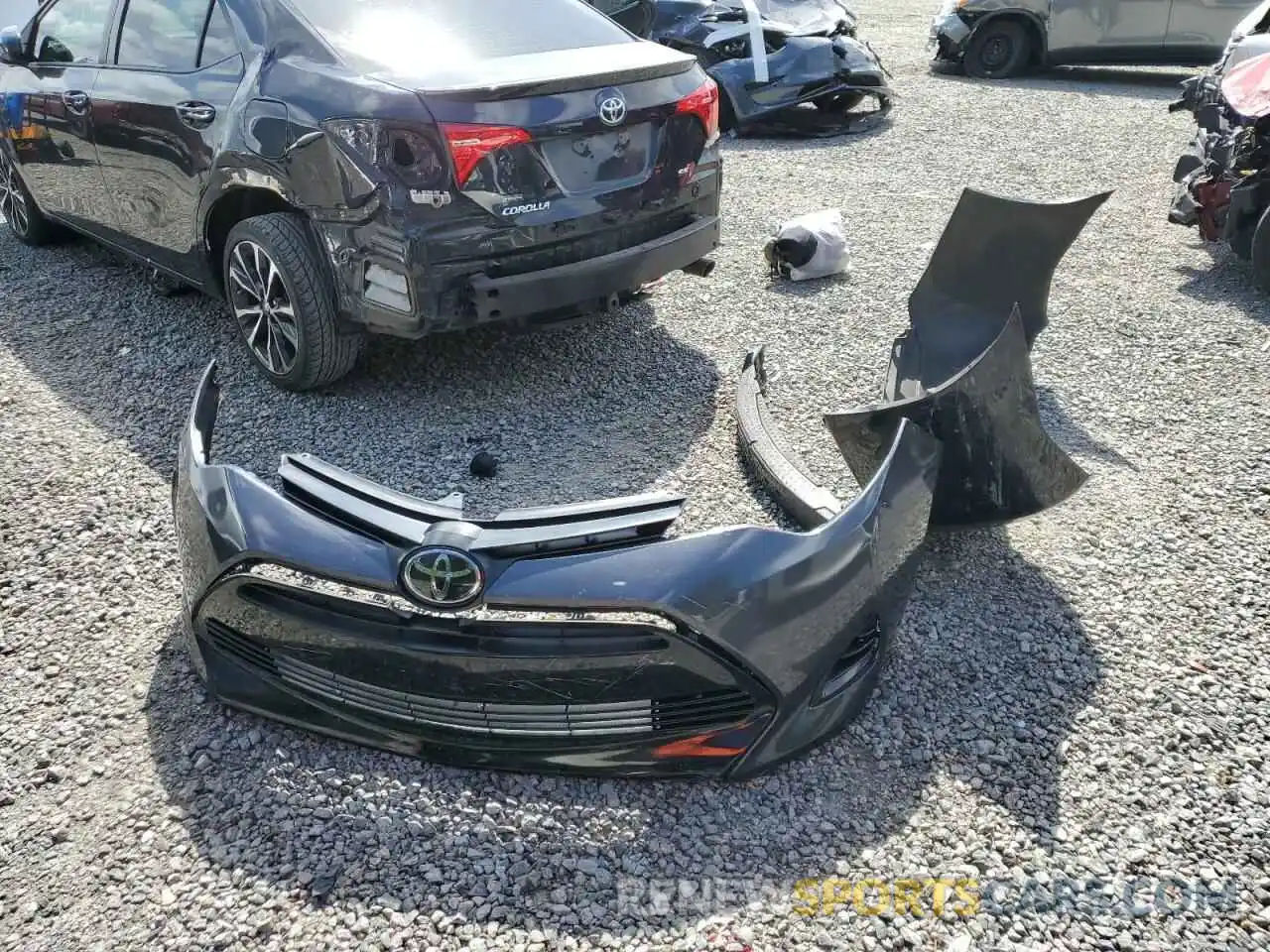 12 Photograph of a damaged car 5YFBURHE2KP888440 TOYOTA COROLLA 2019