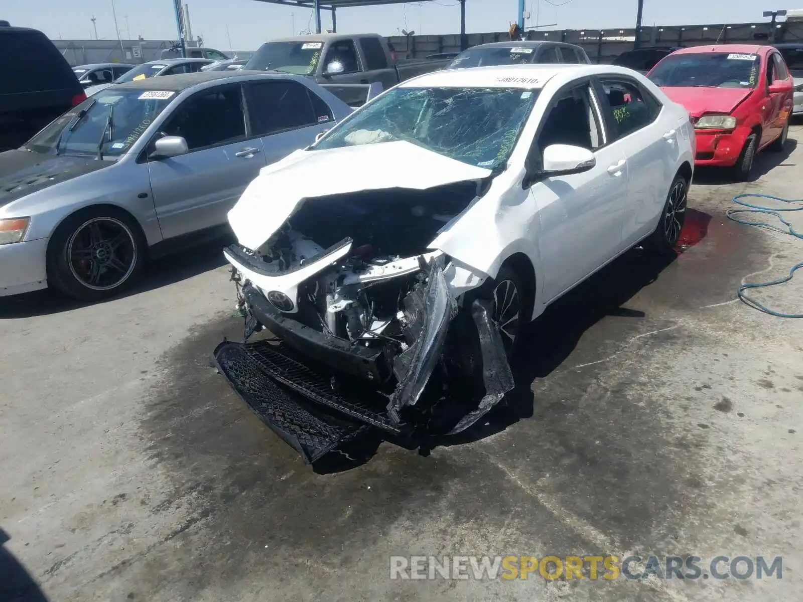 2 Photograph of a damaged car 5YFBURHE2KP912557 TOYOTA COROLLA 2019