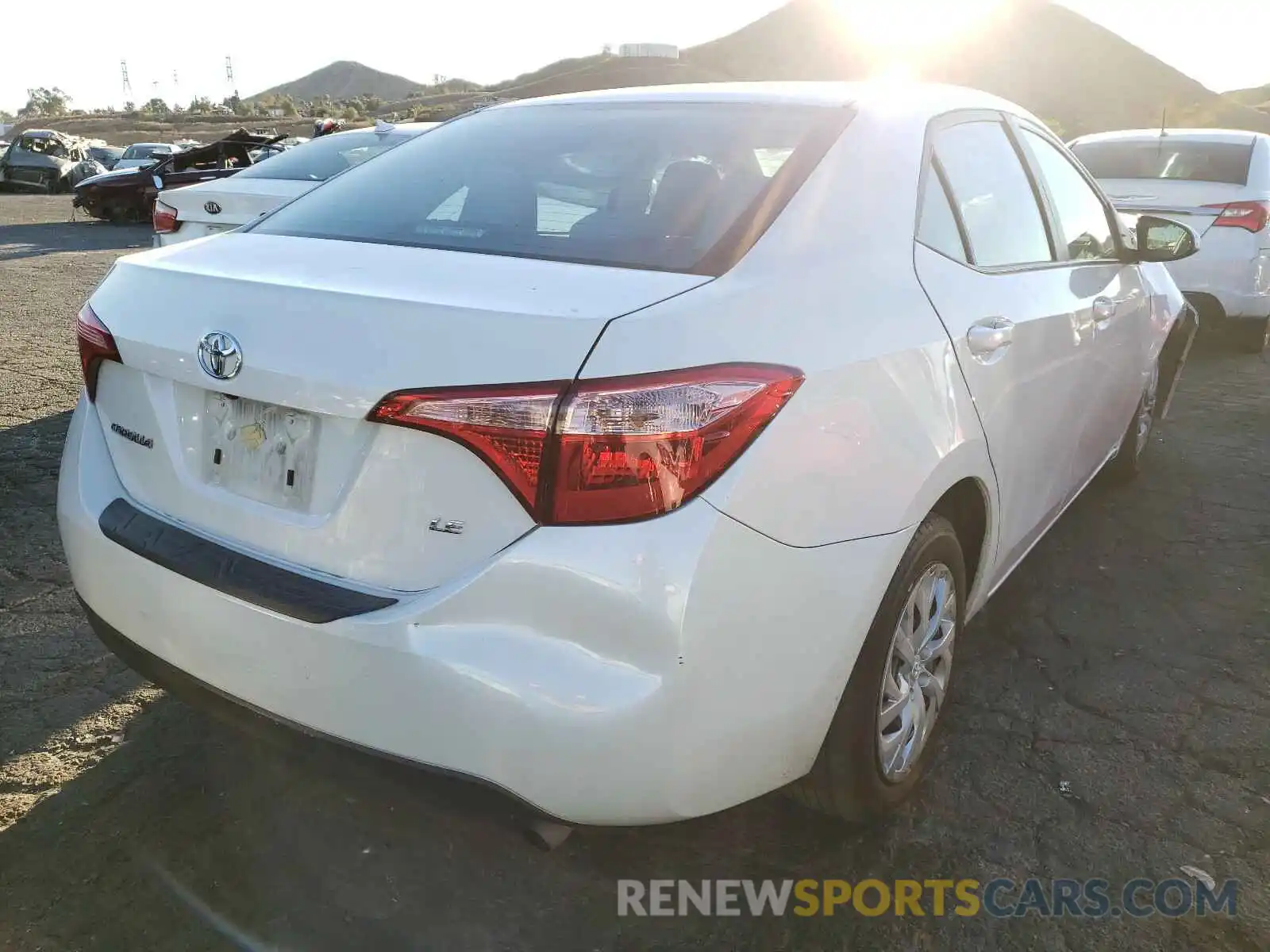 4 Photograph of a damaged car 5YFBURHE2KP922828 TOYOTA COROLLA 2019