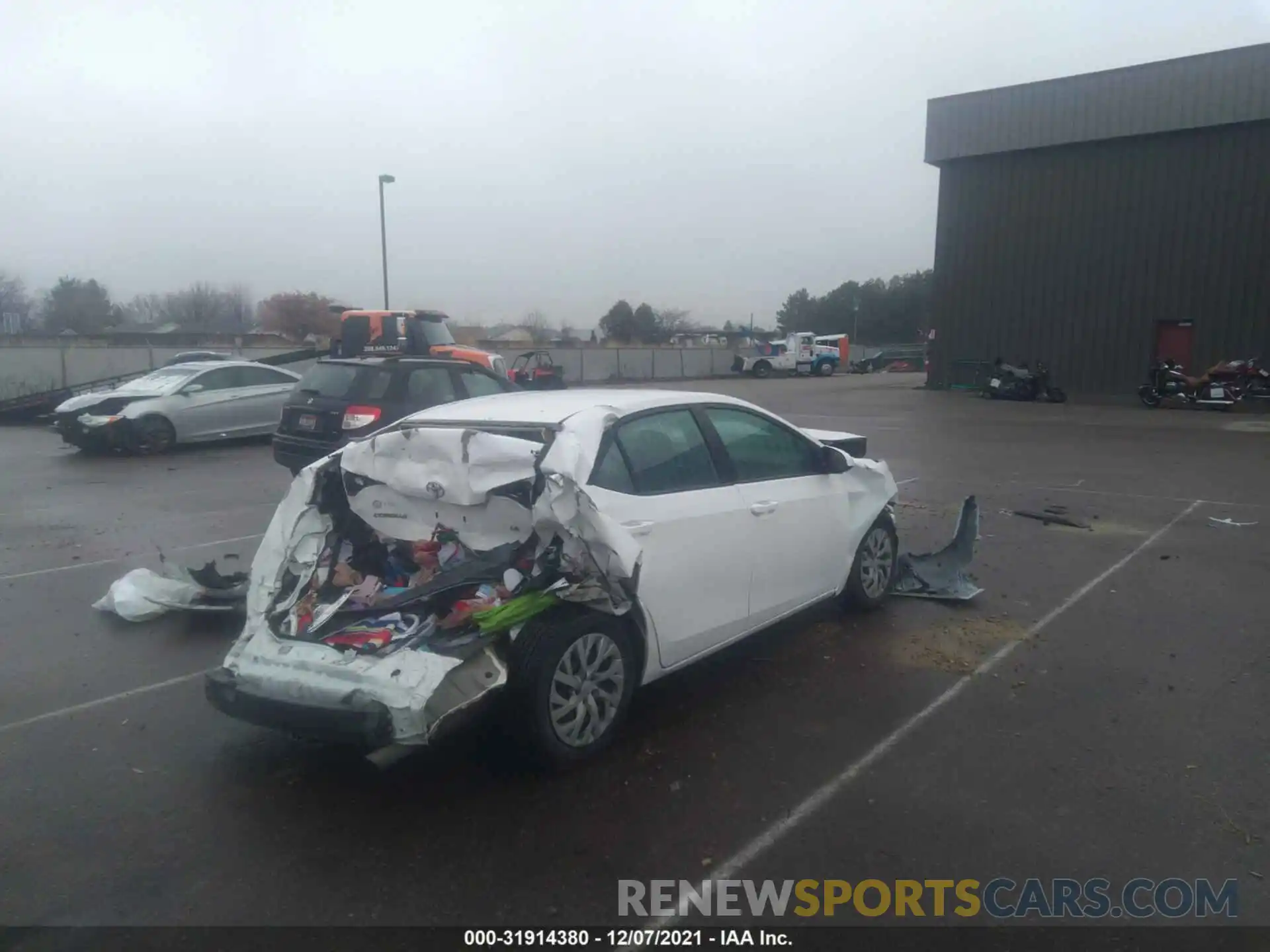 4 Photograph of a damaged car 5YFBURHE2KP931223 TOYOTA COROLLA 2019