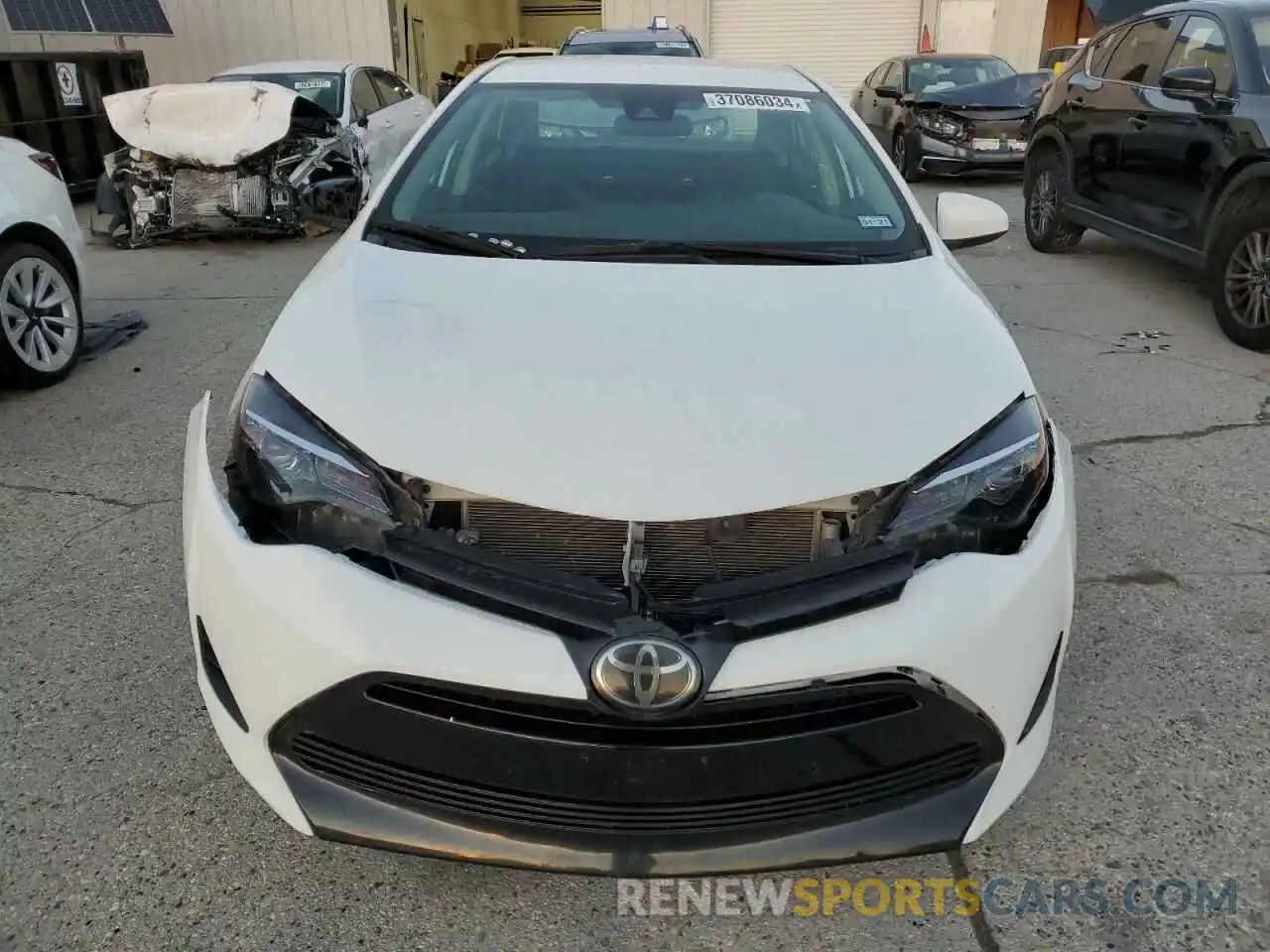 5 Photograph of a damaged car 5YFBURHE2KP939872 TOYOTA COROLLA 2019