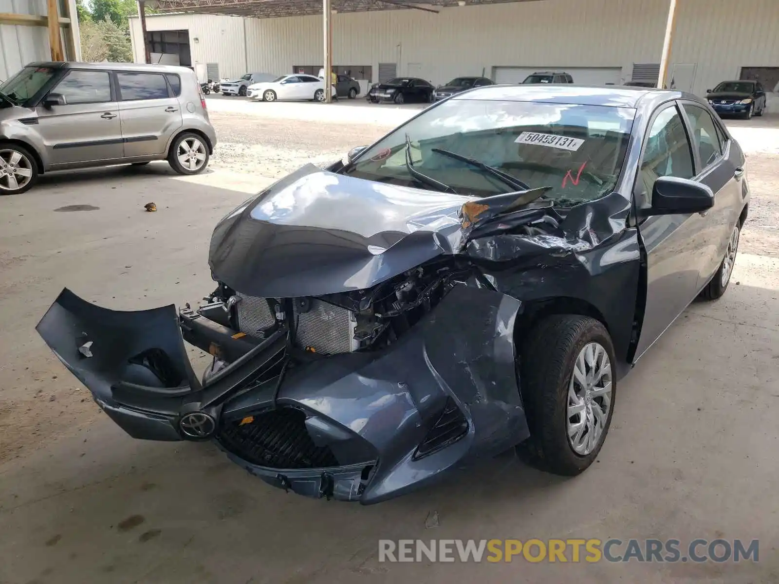 2 Photograph of a damaged car 5YFBURHE2KP945753 TOYOTA COROLLA 2019