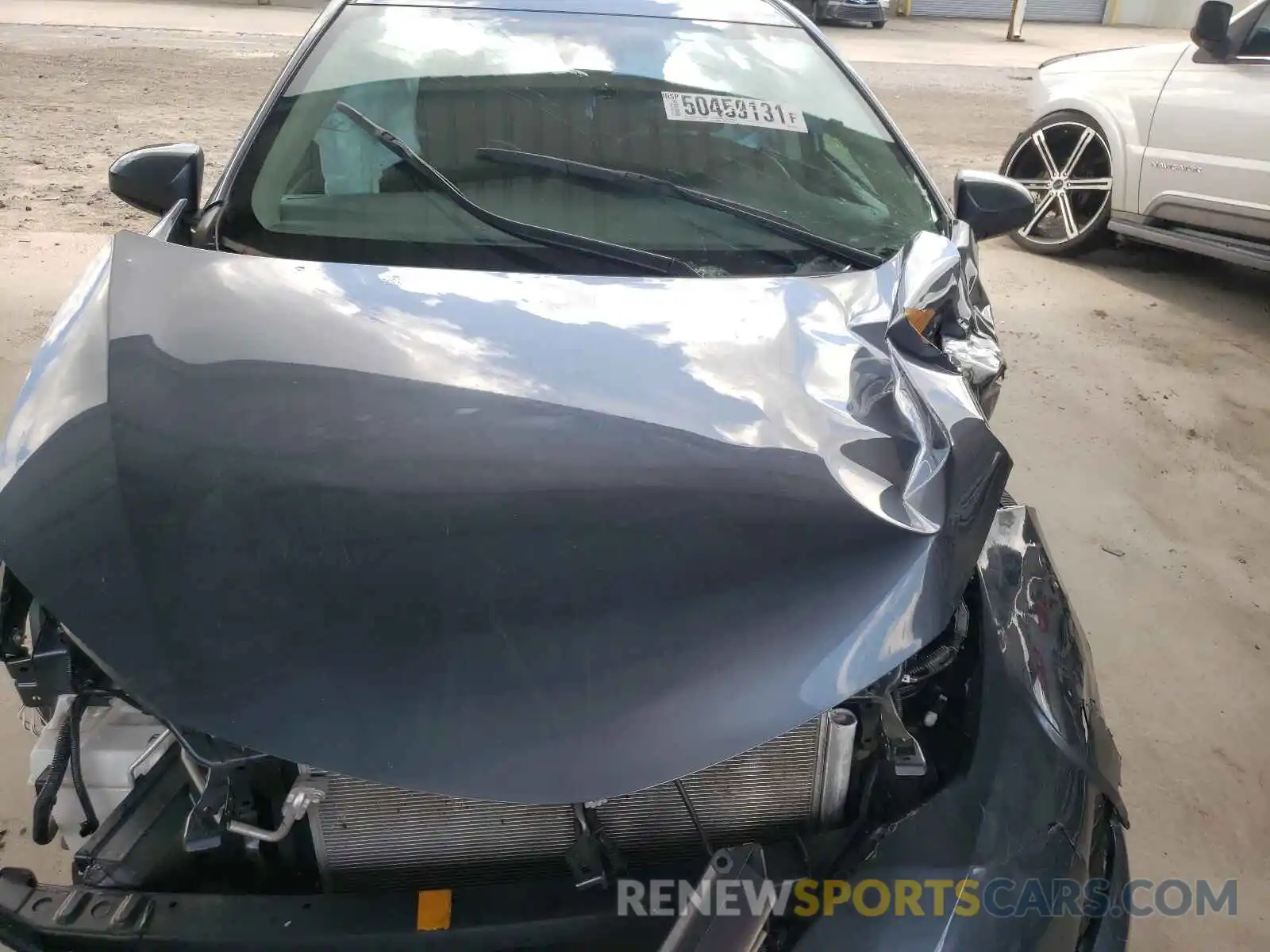 7 Photograph of a damaged car 5YFBURHE2KP945753 TOYOTA COROLLA 2019