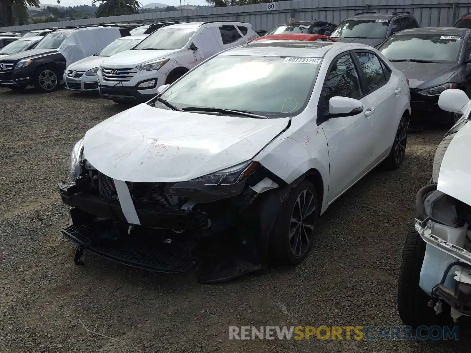 2 Photograph of a damaged car 5YFBURHE3KP860310 TOYOTA COROLLA 2019