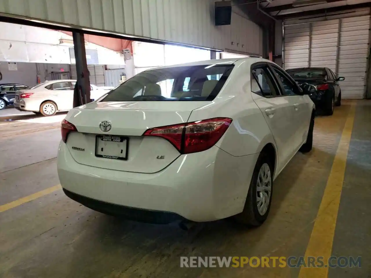 4 Photograph of a damaged car 5YFBURHE3KP865393 TOYOTA COROLLA 2019