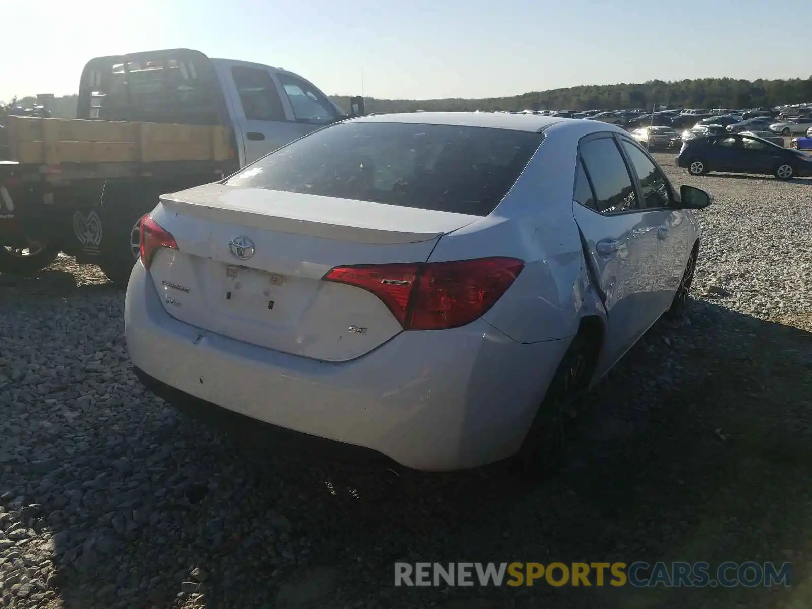 4 Photograph of a damaged car 5YFBURHE3KP870061 TOYOTA COROLLA 2019