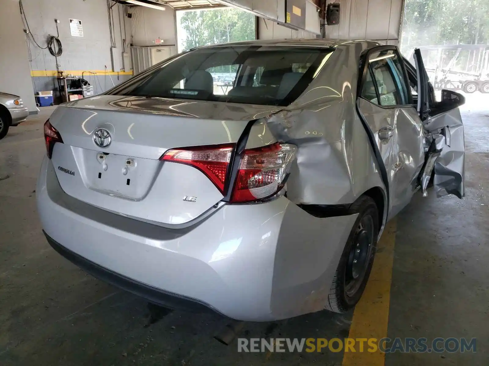 4 Photograph of a damaged car 5YFBURHE3KP870495 TOYOTA COROLLA 2019