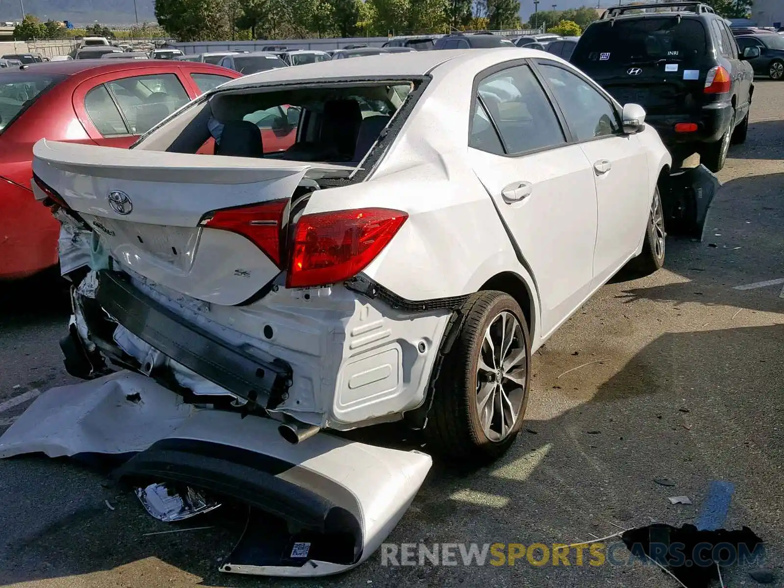 4 Photograph of a damaged car 5YFBURHE3KP871758 TOYOTA COROLLA 2019