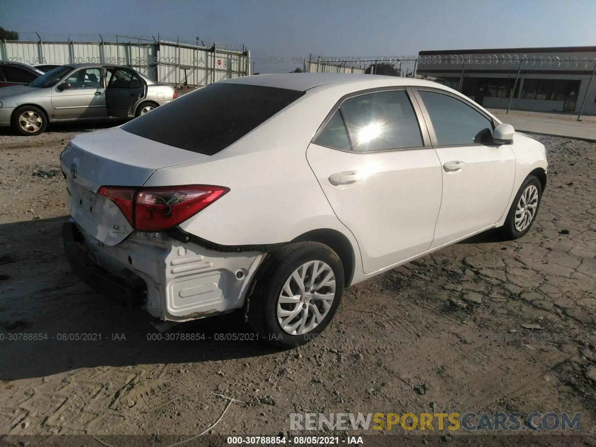 4 Photograph of a damaged car 5YFBURHE3KP878189 TOYOTA COROLLA 2019