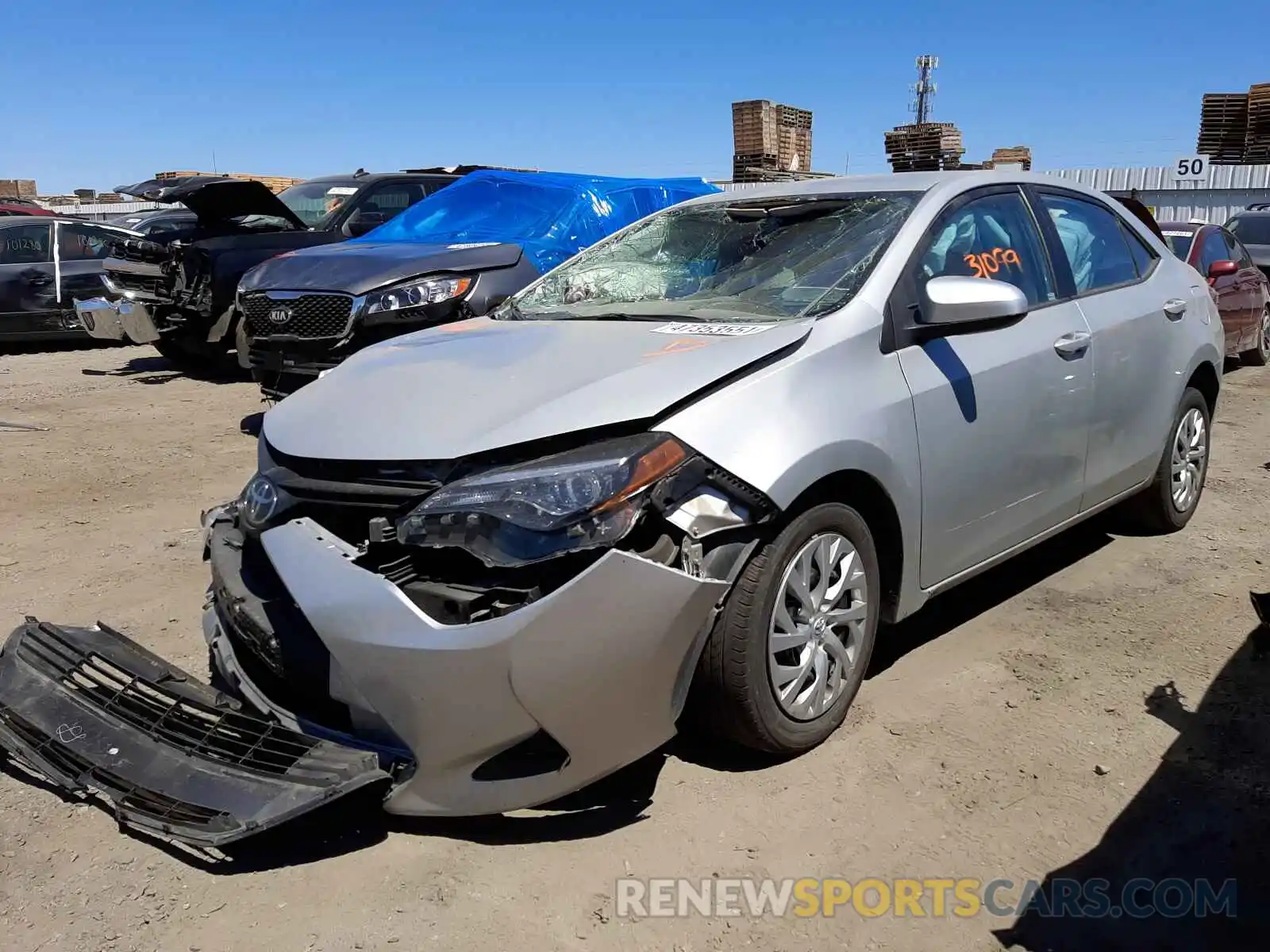 2 Photograph of a damaged car 5YFBURHE3KP879570 TOYOTA COROLLA 2019