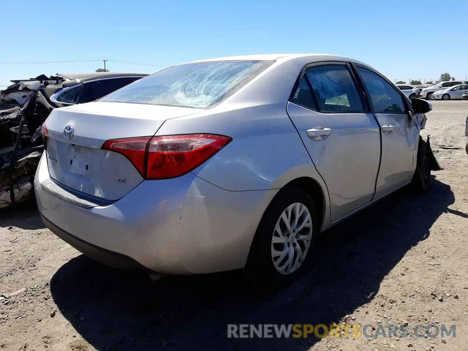 4 Photograph of a damaged car 5YFBURHE3KP879570 TOYOTA COROLLA 2019