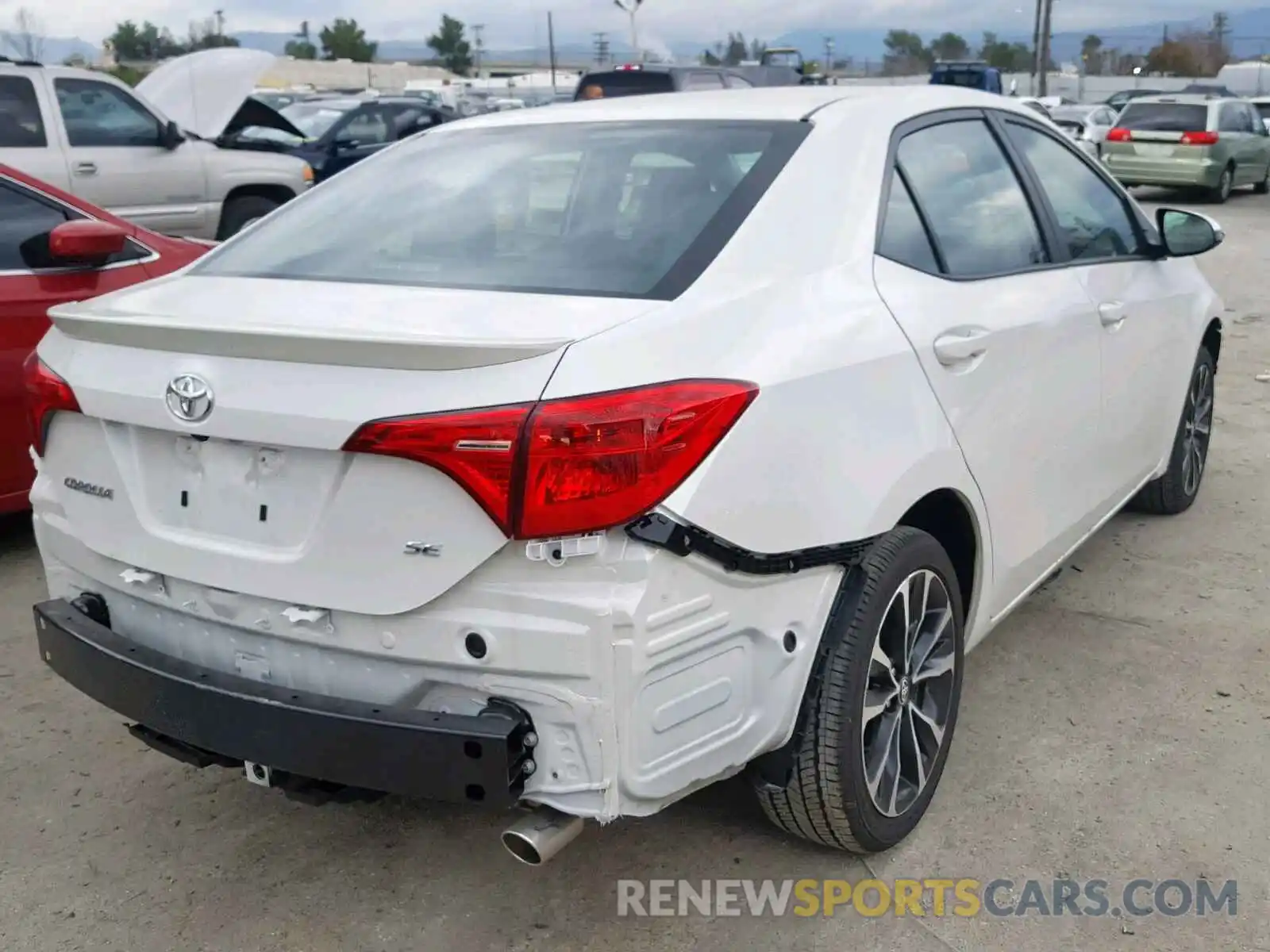 4 Photograph of a damaged car 5YFBURHE3KP879701 TOYOTA COROLLA 2019