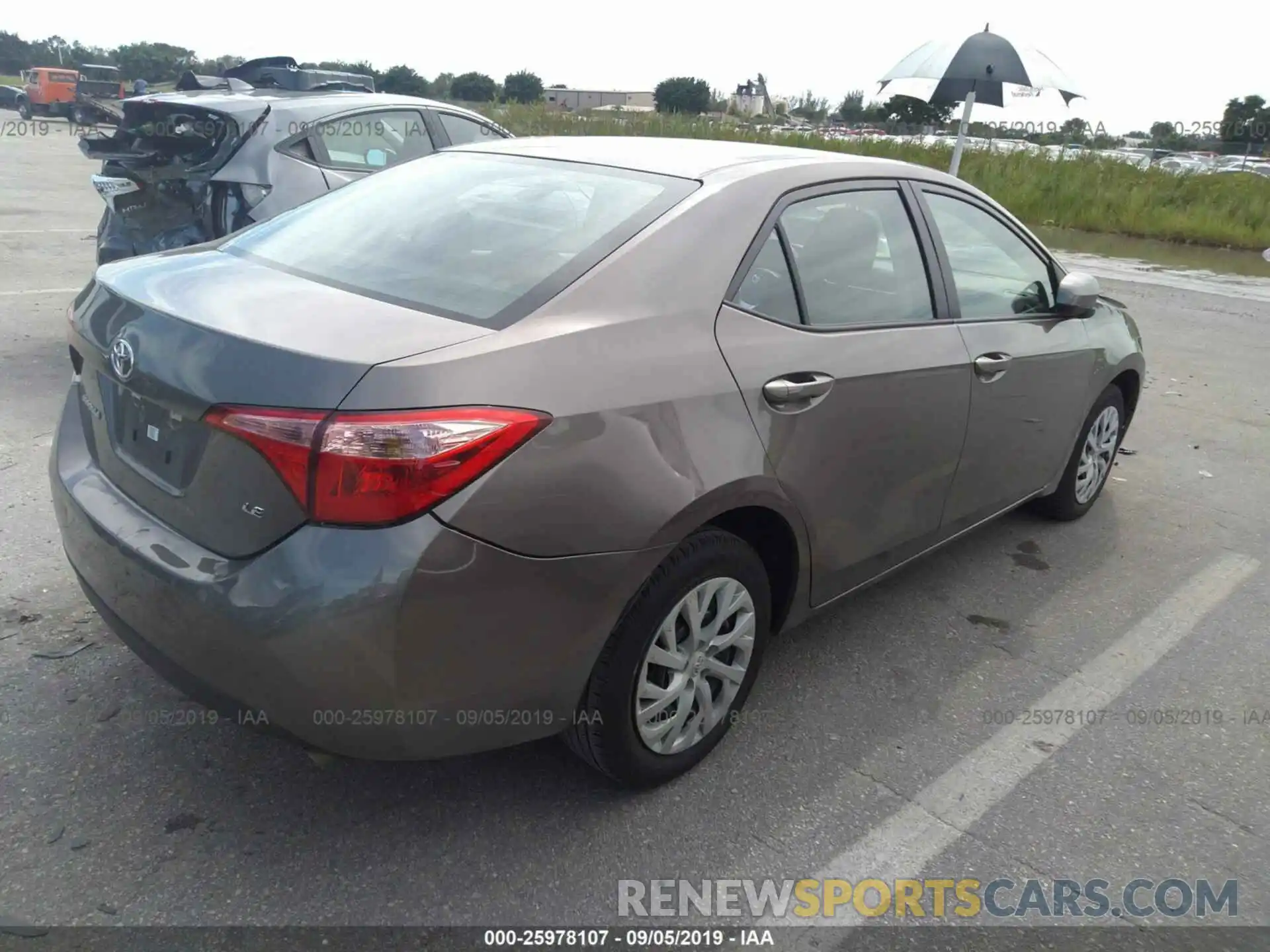 4 Фотография поврежденного автомобиля 5YFBURHE3KP881674 TOYOTA COROLLA 2019