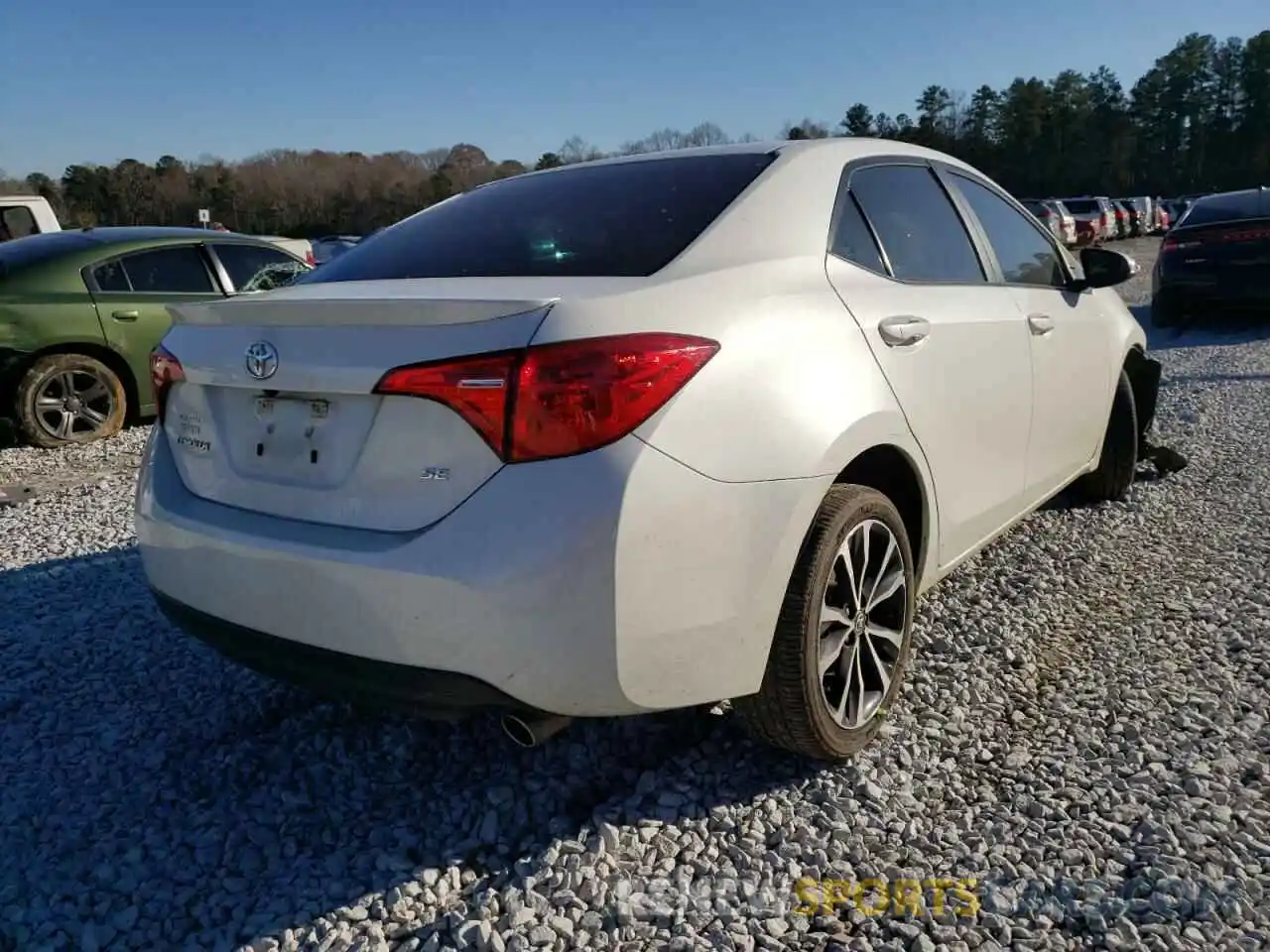 4 Photograph of a damaged car 5YFBURHE3KP882890 TOYOTA COROLLA 2019