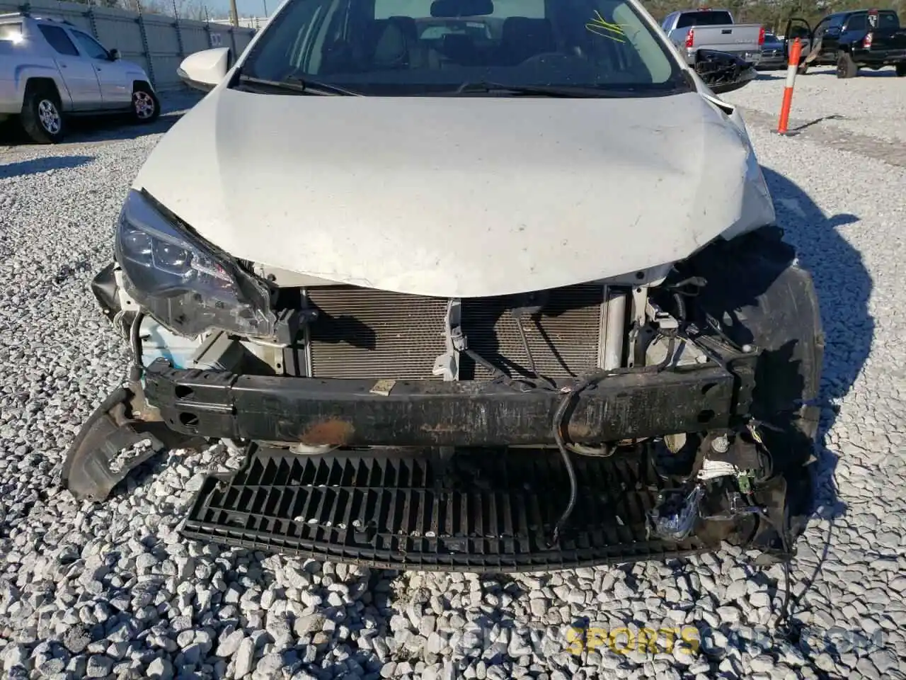 7 Photograph of a damaged car 5YFBURHE3KP882890 TOYOTA COROLLA 2019