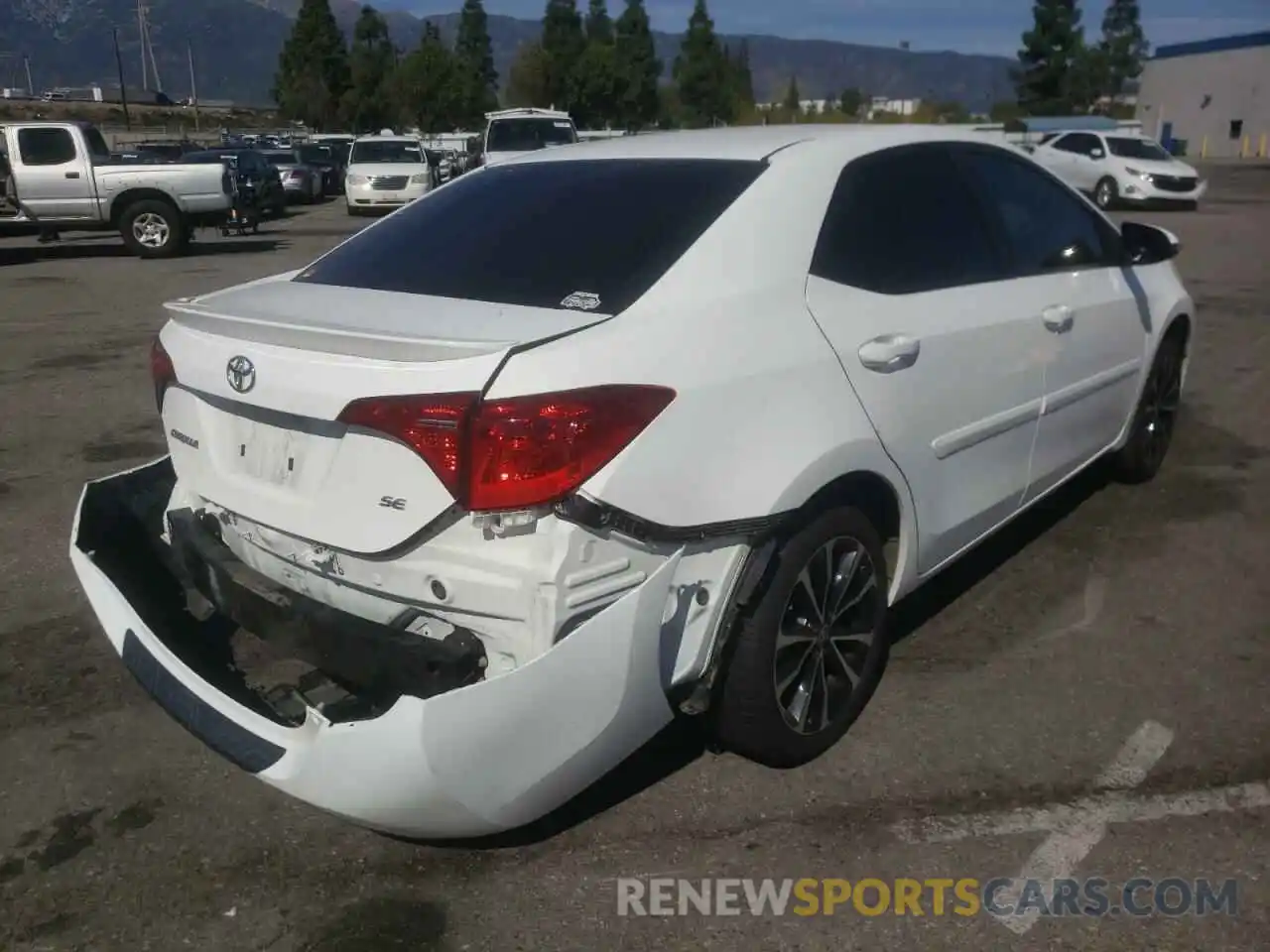 4 Photograph of a damaged car 5YFBURHE3KP899799 TOYOTA COROLLA 2019