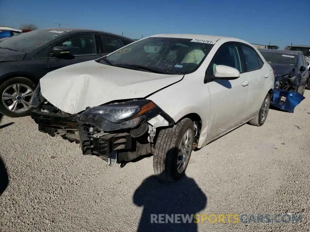 2 Photograph of a damaged car 5YFBURHE3KP908677 TOYOTA COROLLA 2019