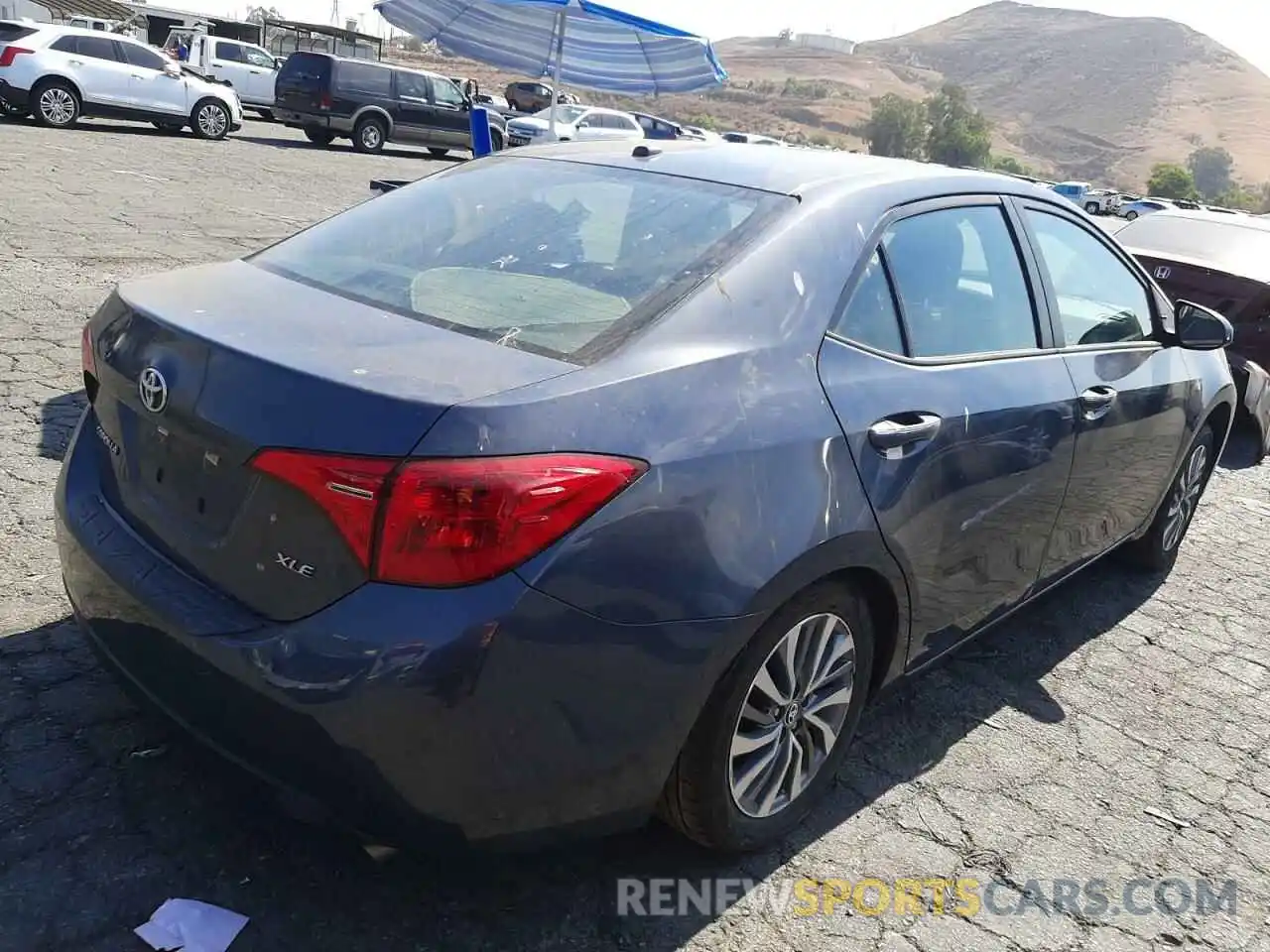 4 Photograph of a damaged car 5YFBURHE3KP914057 TOYOTA COROLLA 2019