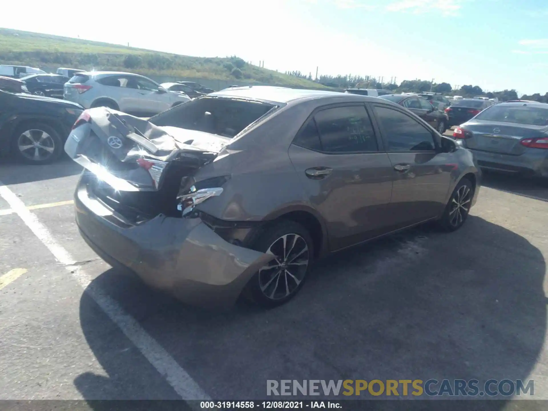 4 Photograph of a damaged car 5YFBURHE4KP858596 TOYOTA COROLLA 2019