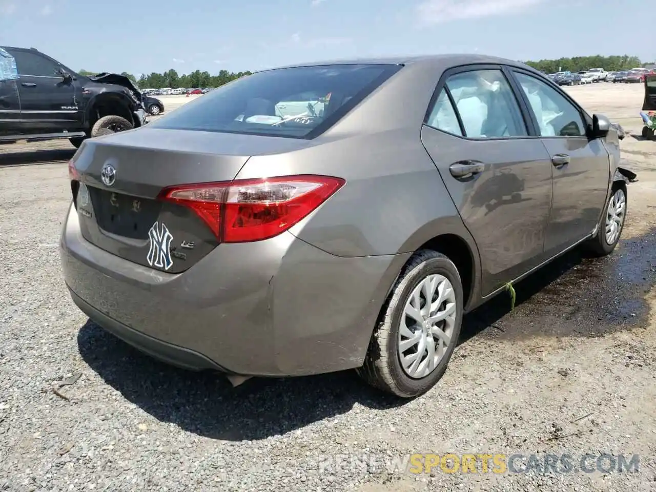 4 Photograph of a damaged car 5YFBURHE4KP859649 TOYOTA COROLLA 2019