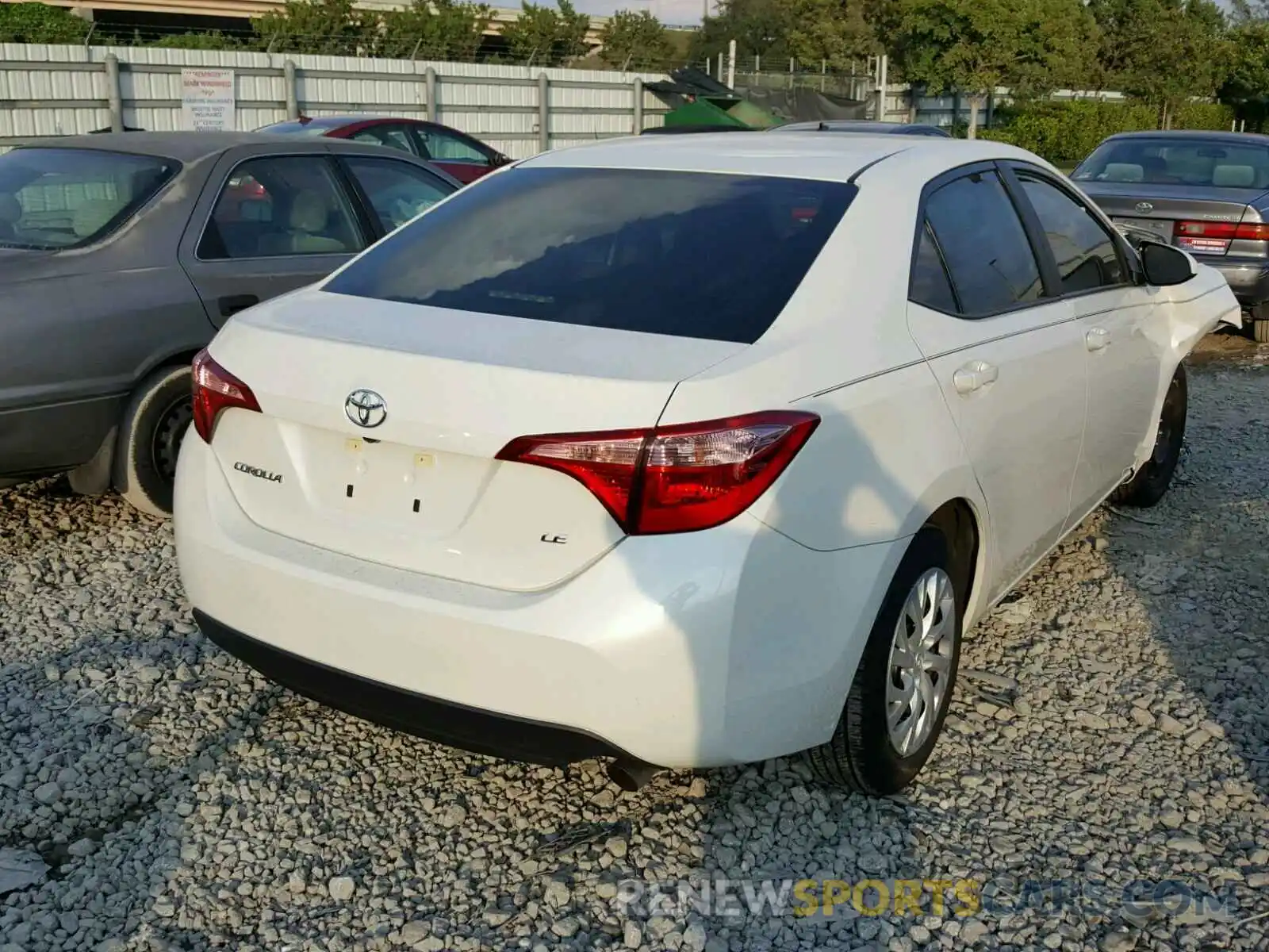 4 Photograph of a damaged car 5YFBURHE4KP863345 TOYOTA COROLLA 2019