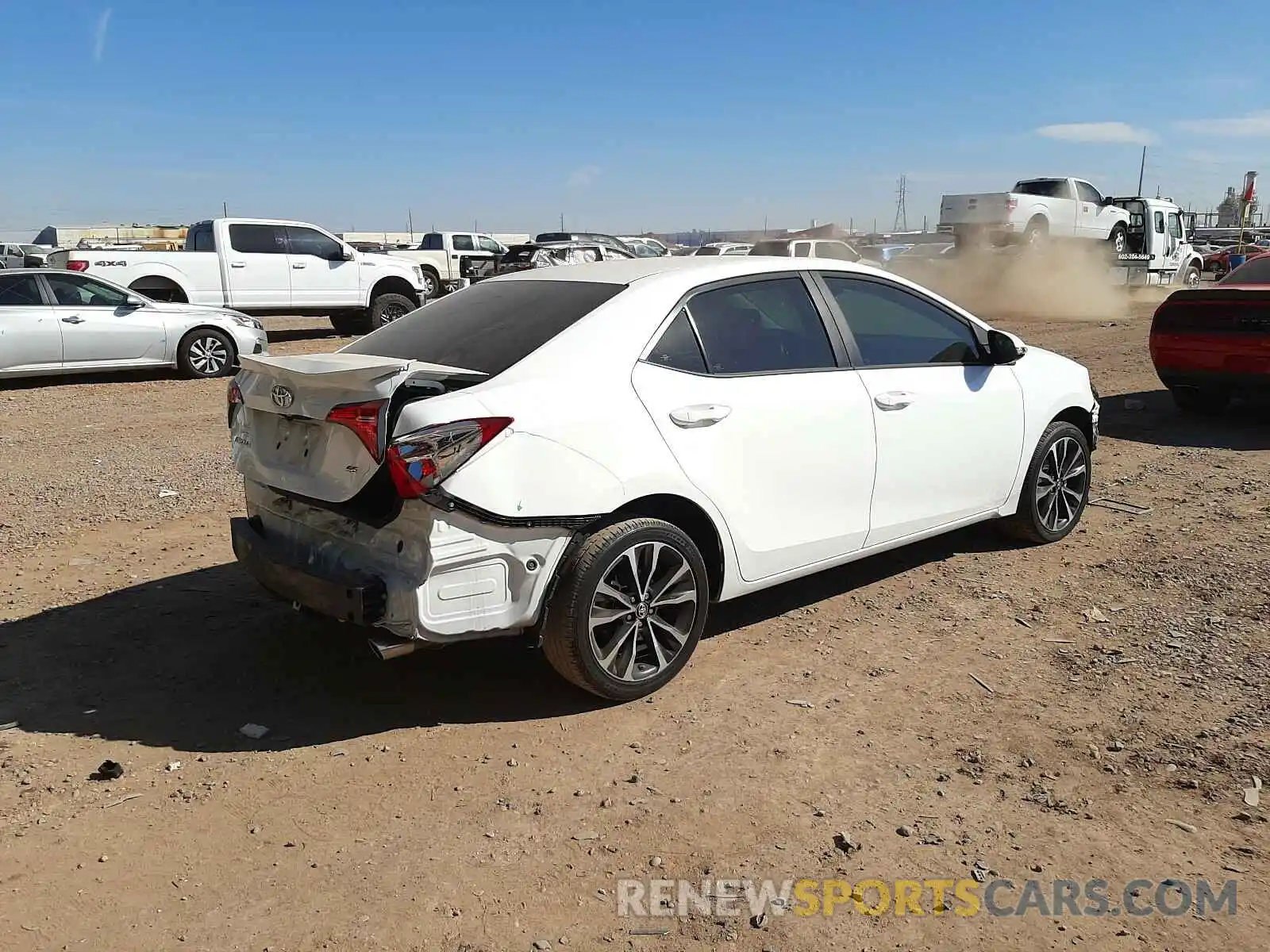 4 Photograph of a damaged car 5YFBURHE4KP863801 TOYOTA COROLLA 2019