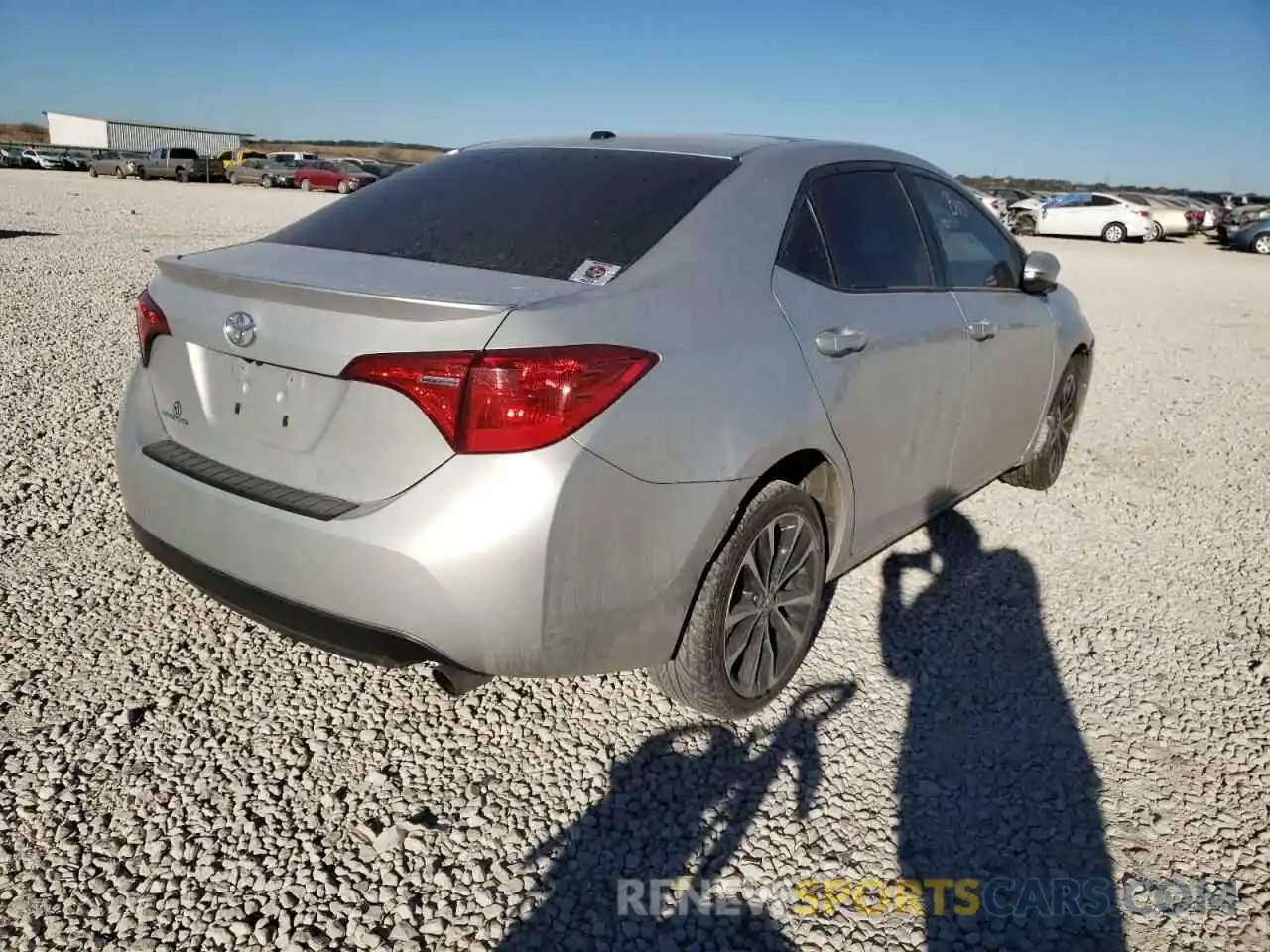 4 Photograph of a damaged car 5YFBURHE4KP864981 TOYOTA COROLLA 2019