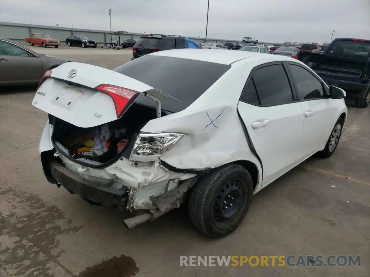 4 Photograph of a damaged car 5YFBURHE4KP865564 TOYOTA COROLLA 2019