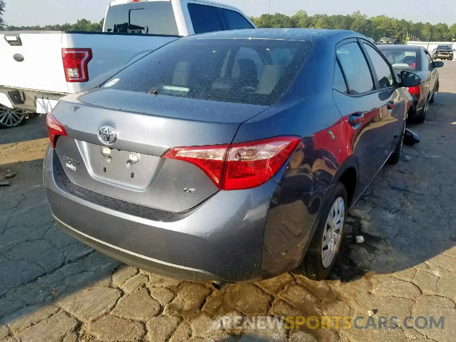 4 Photograph of a damaged car 5YFBURHE4KP869713 TOYOTA COROLLA 2019