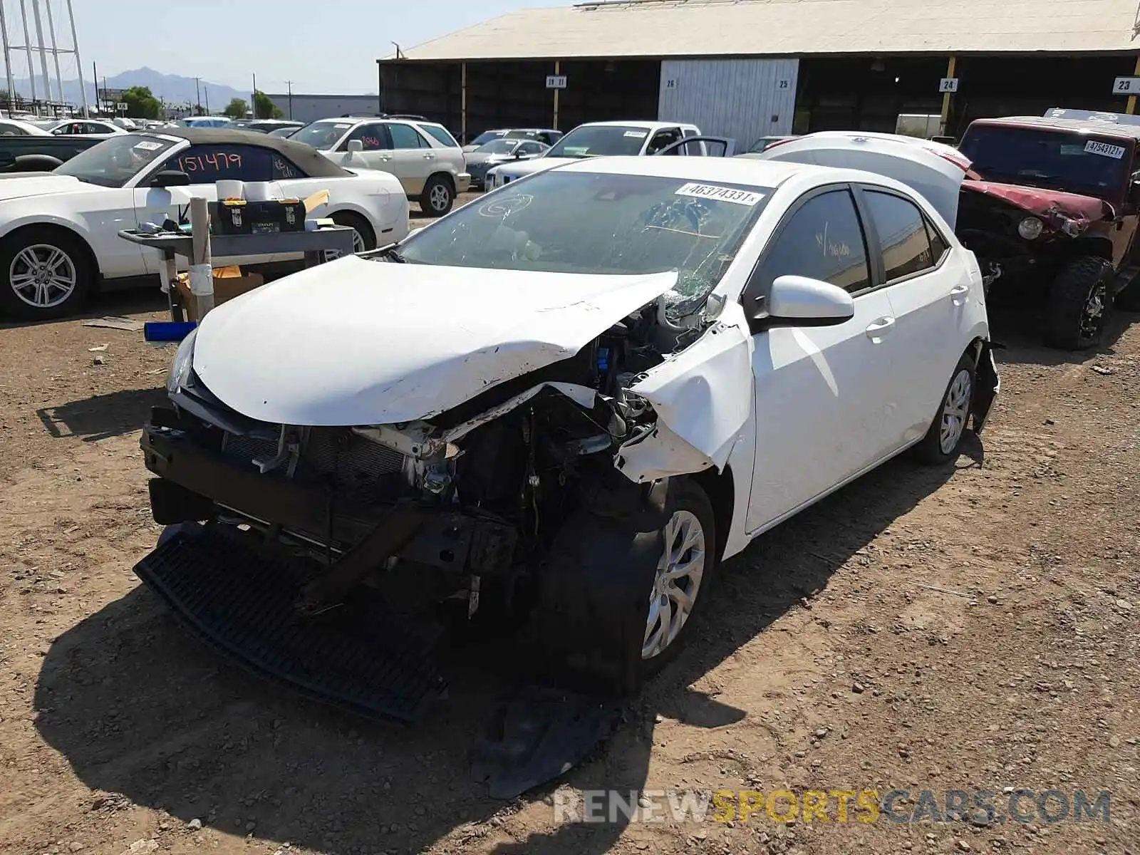 2 Photograph of a damaged car 5YFBURHE4KP873194 TOYOTA COROLLA 2019