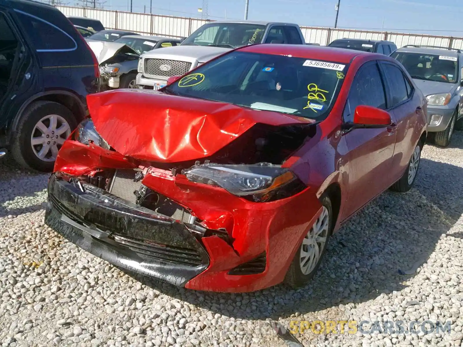 2 Photograph of a damaged car 5YFBURHE4KP879044 TOYOTA COROLLA 2019