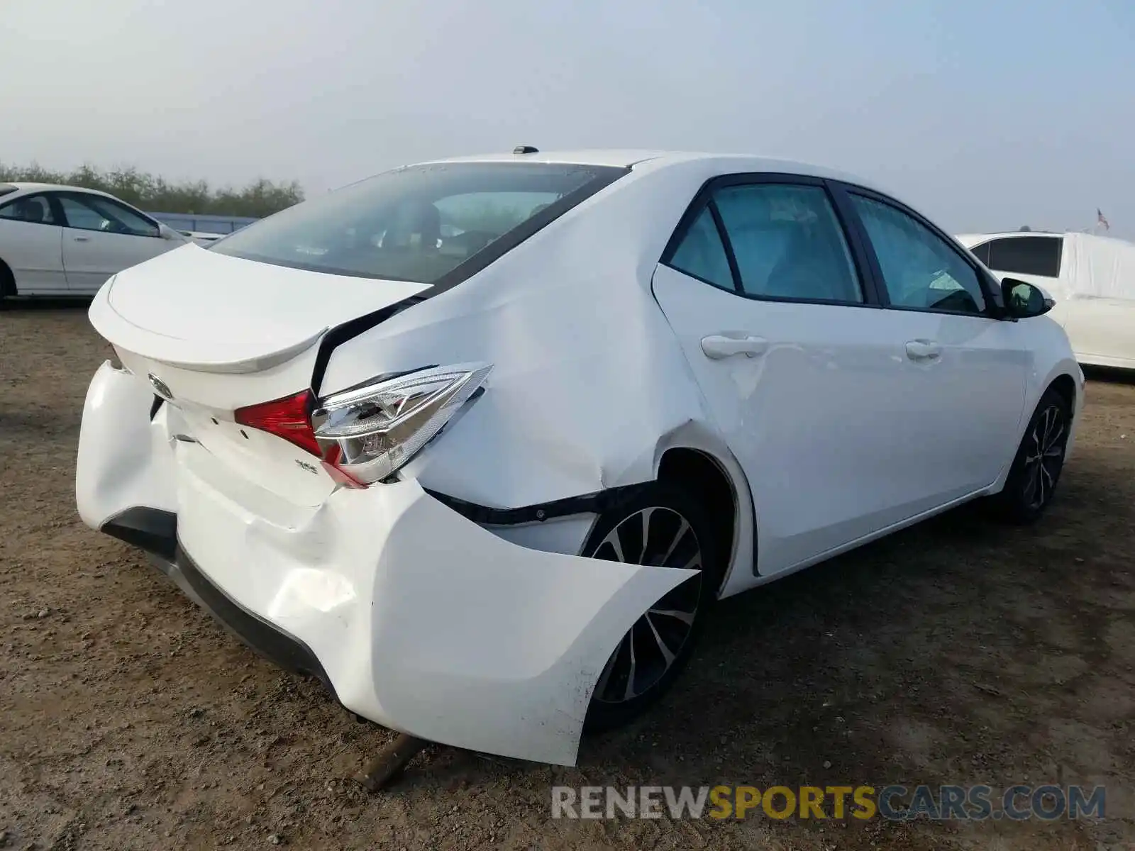 4 Photograph of a damaged car 5YFBURHE4KP879402 TOYOTA COROLLA 2019