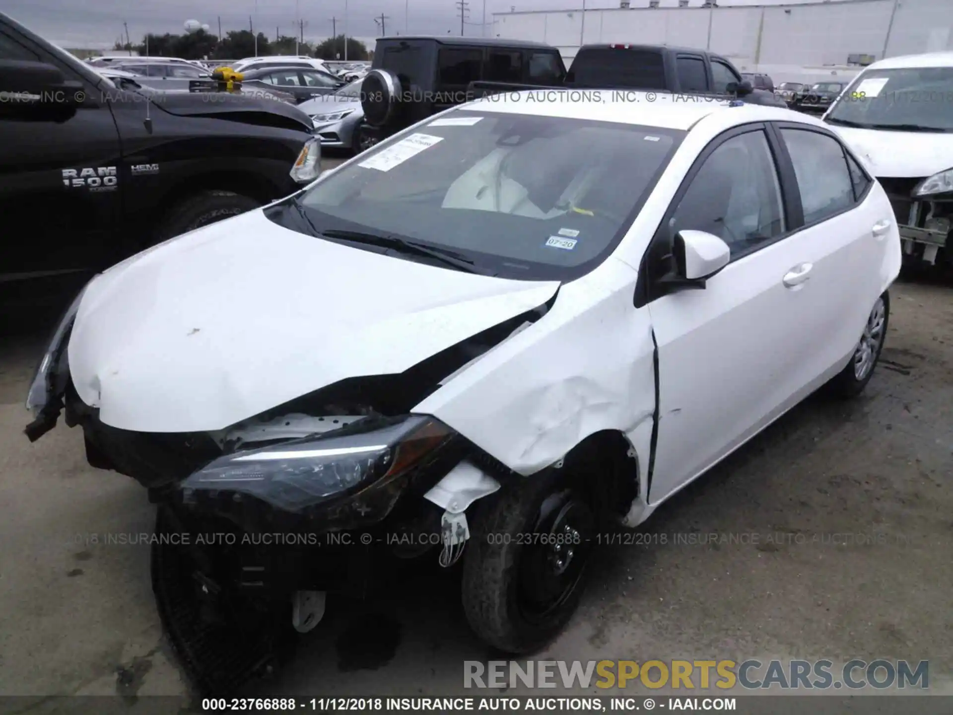 2 Photograph of a damaged car 5YFBURHE4KP880310 Toyota Corolla 2019