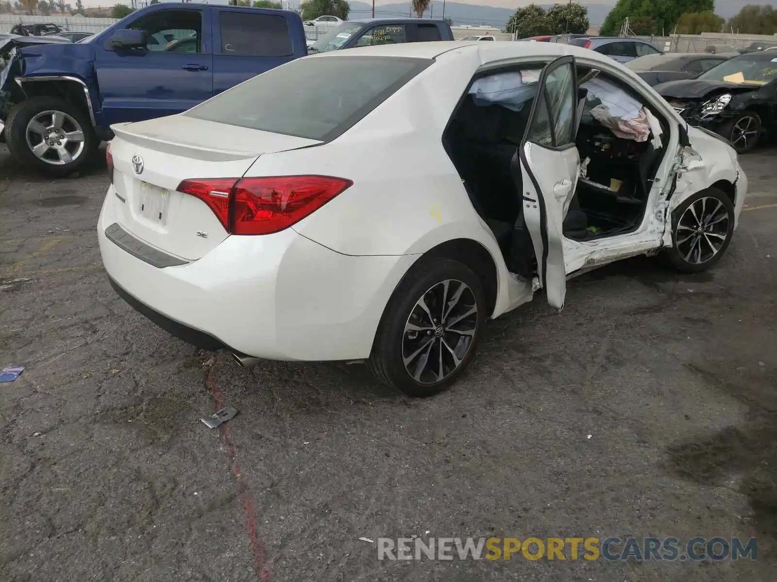 4 Photograph of a damaged car 5YFBURHE4KP887080 TOYOTA COROLLA 2019