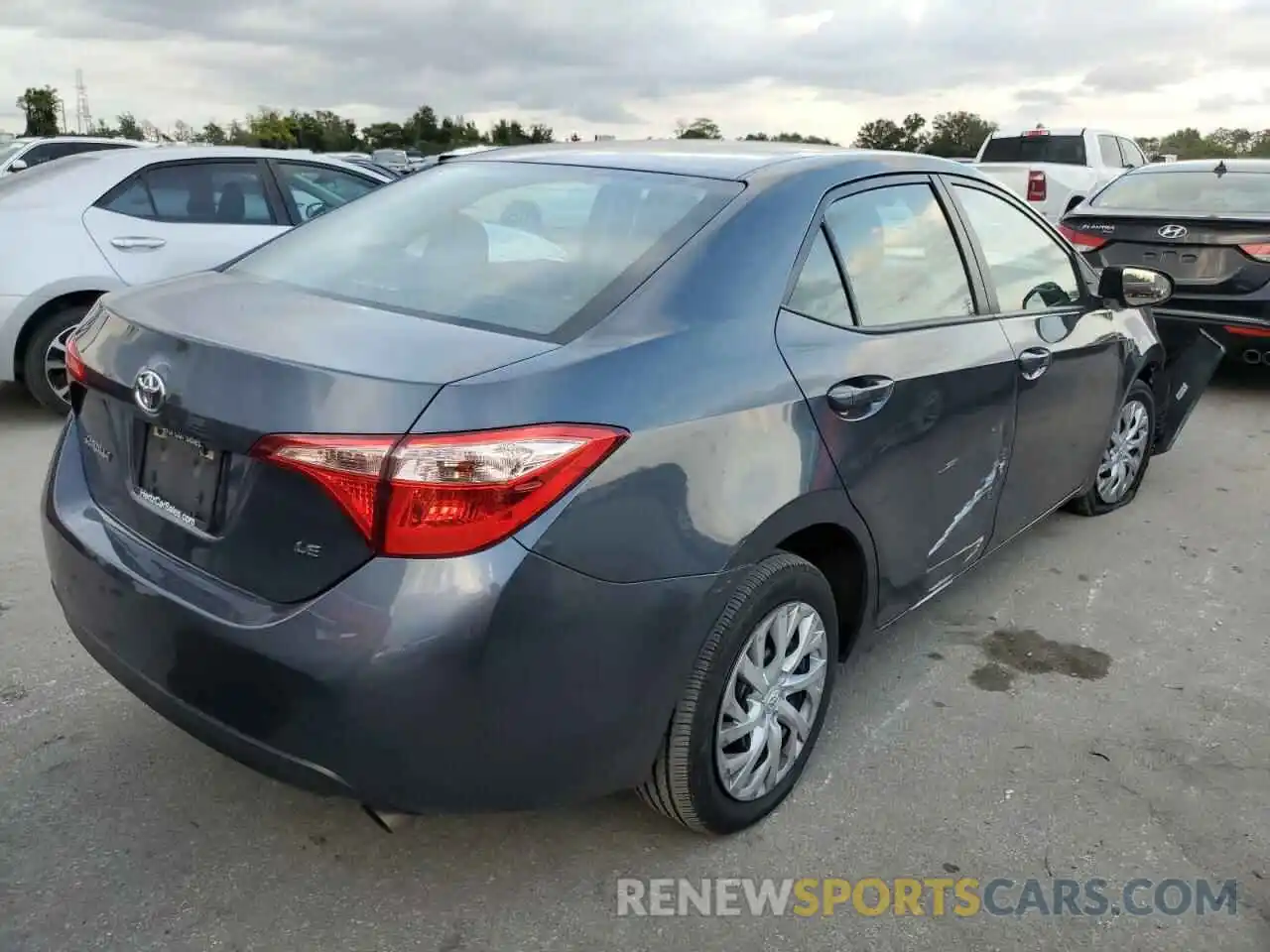 4 Photograph of a damaged car 5YFBURHE4KP889752 TOYOTA COROLLA 2019