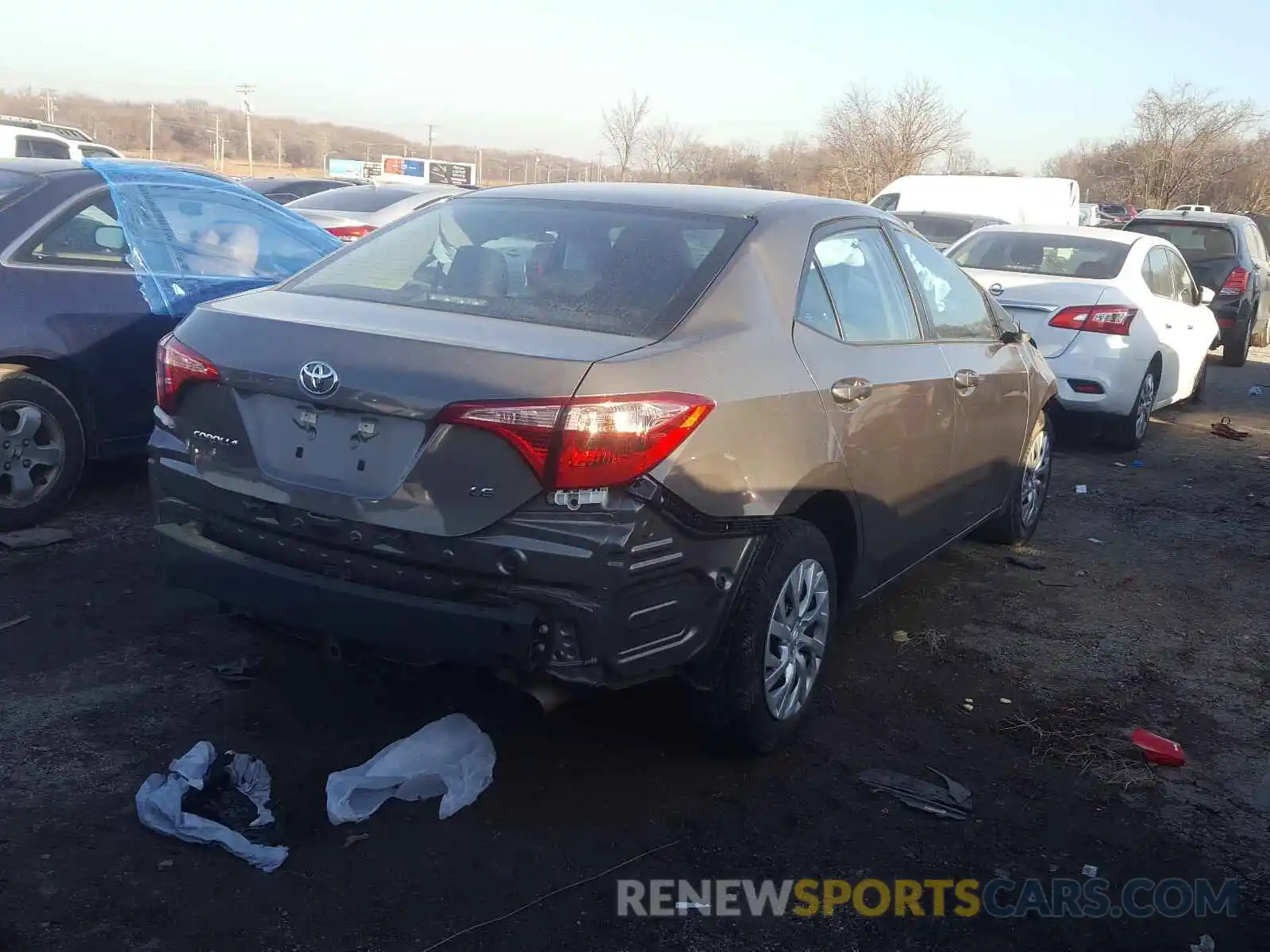 4 Photograph of a damaged car 5YFBURHE4KP937315 TOYOTA COROLLA 2019