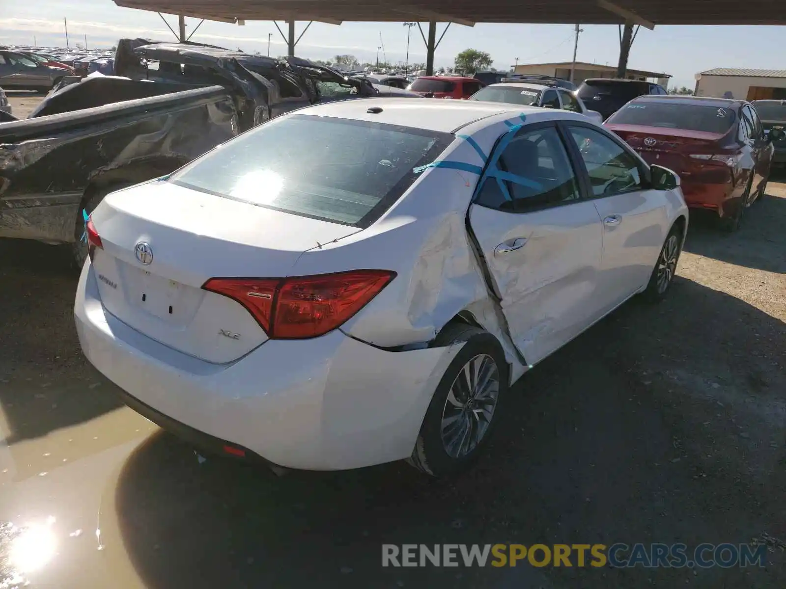 4 Photograph of a damaged car 5YFBURHE4KP943955 TOYOTA COROLLA 2019