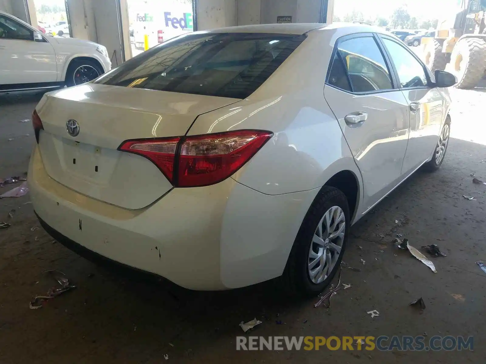 4 Photograph of a damaged car 5YFBURHE5KP869414 TOYOTA COROLLA 2019