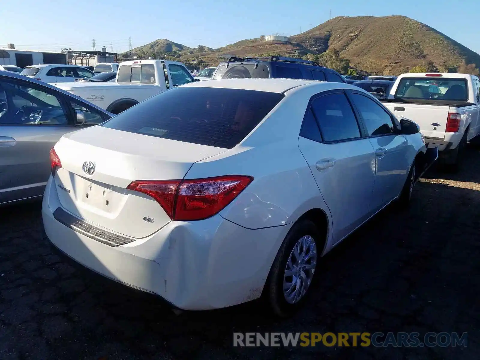 4 Photograph of a damaged car 5YFBURHE5KP875391 TOYOTA COROLLA 2019