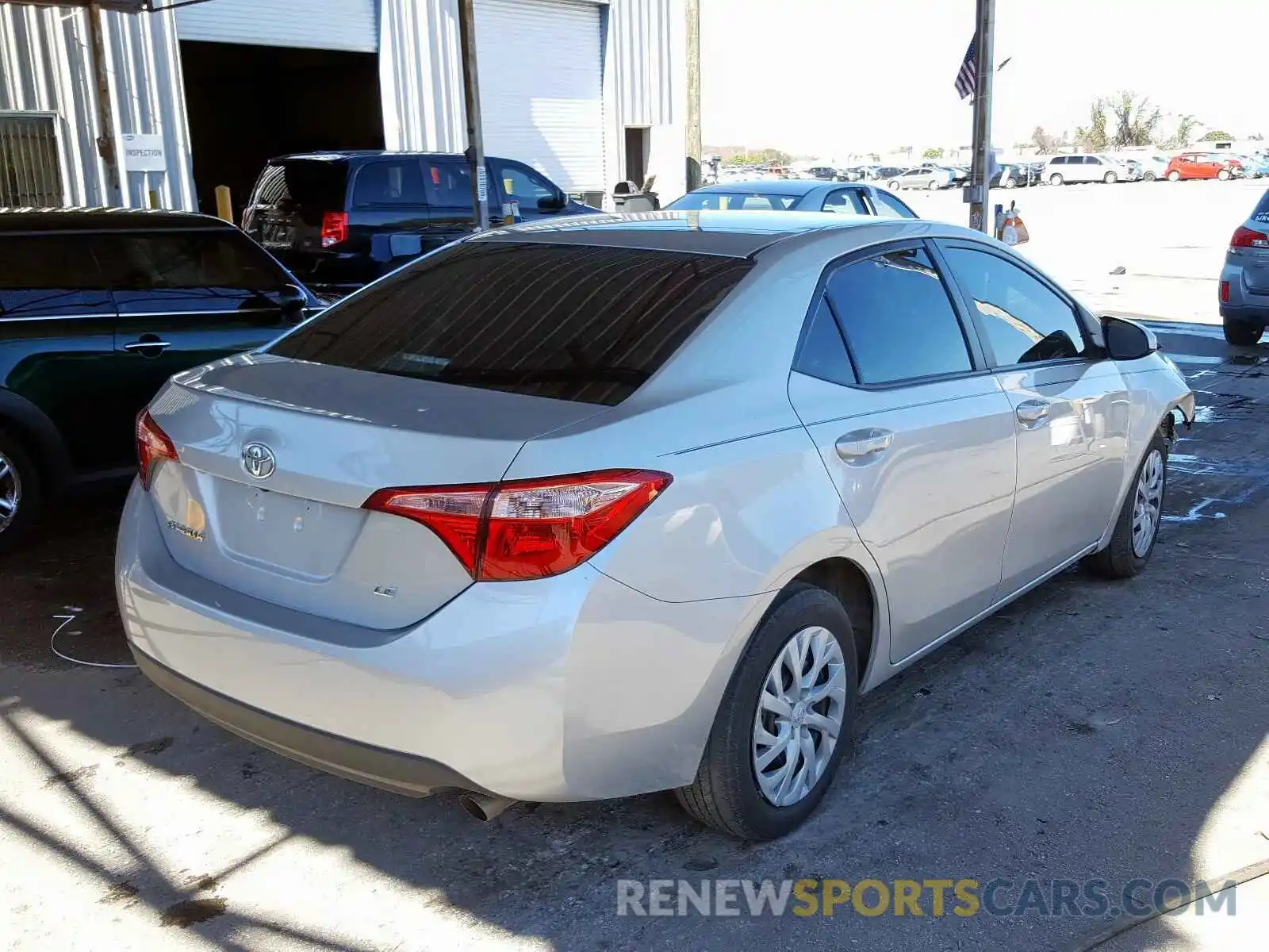 4 Photograph of a damaged car 5YFBURHE5KP877559 TOYOTA COROLLA 2019