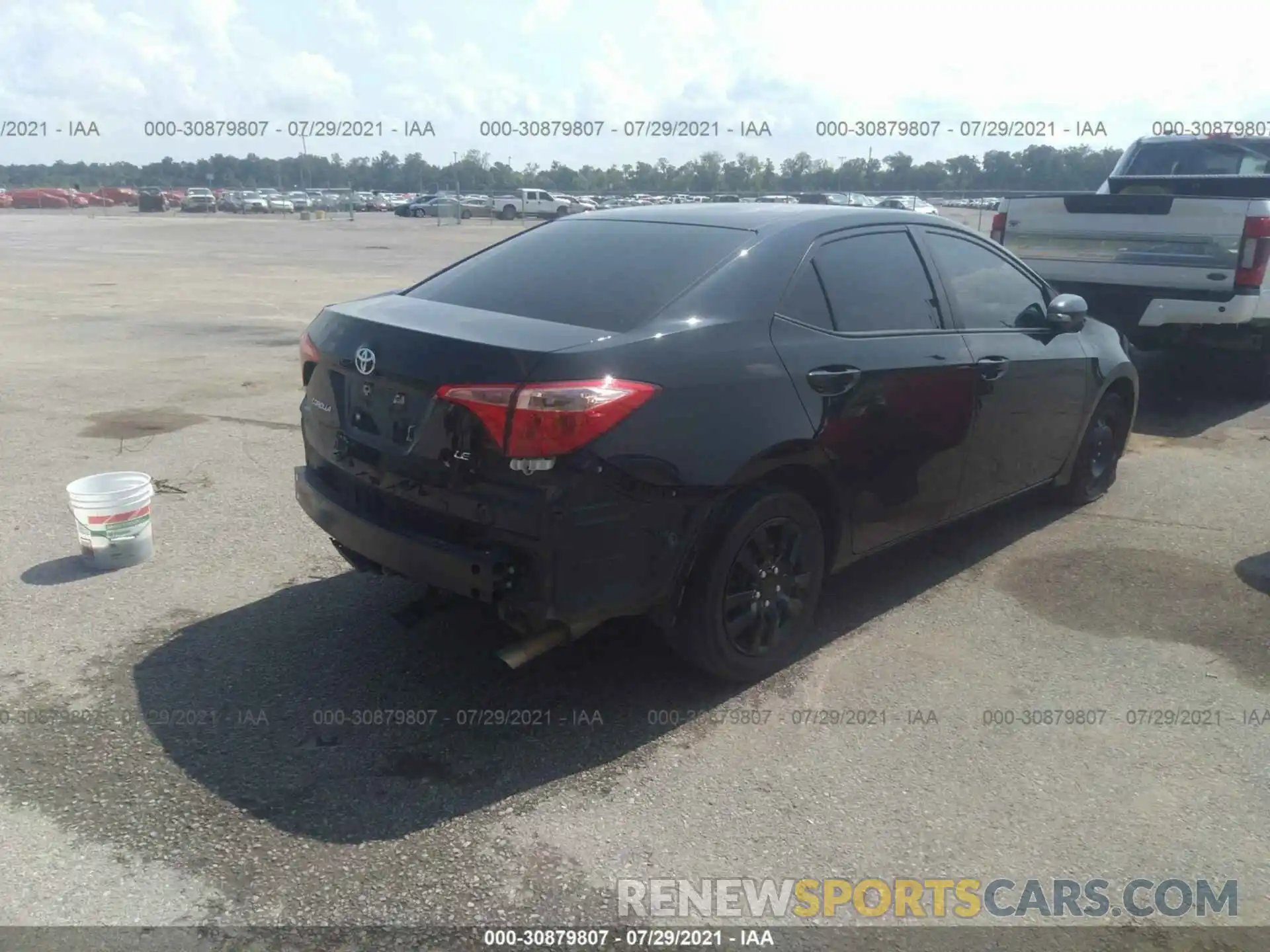 4 Photograph of a damaged car 5YFBURHE5KP877982 TOYOTA COROLLA 2019