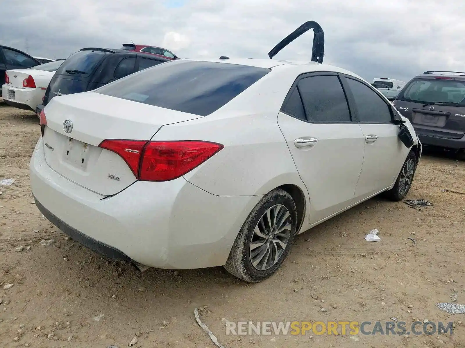 4 Photograph of a damaged car 5YFBURHE5KP878386 TOYOTA COROLLA 2019