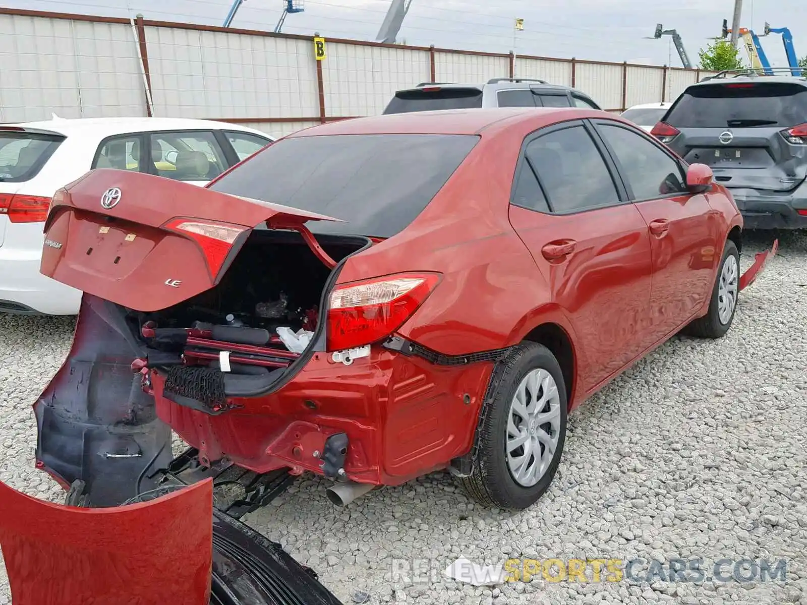 4 Photograph of a damaged car 5YFBURHE5KP883085 TOYOTA COROLLA 2019