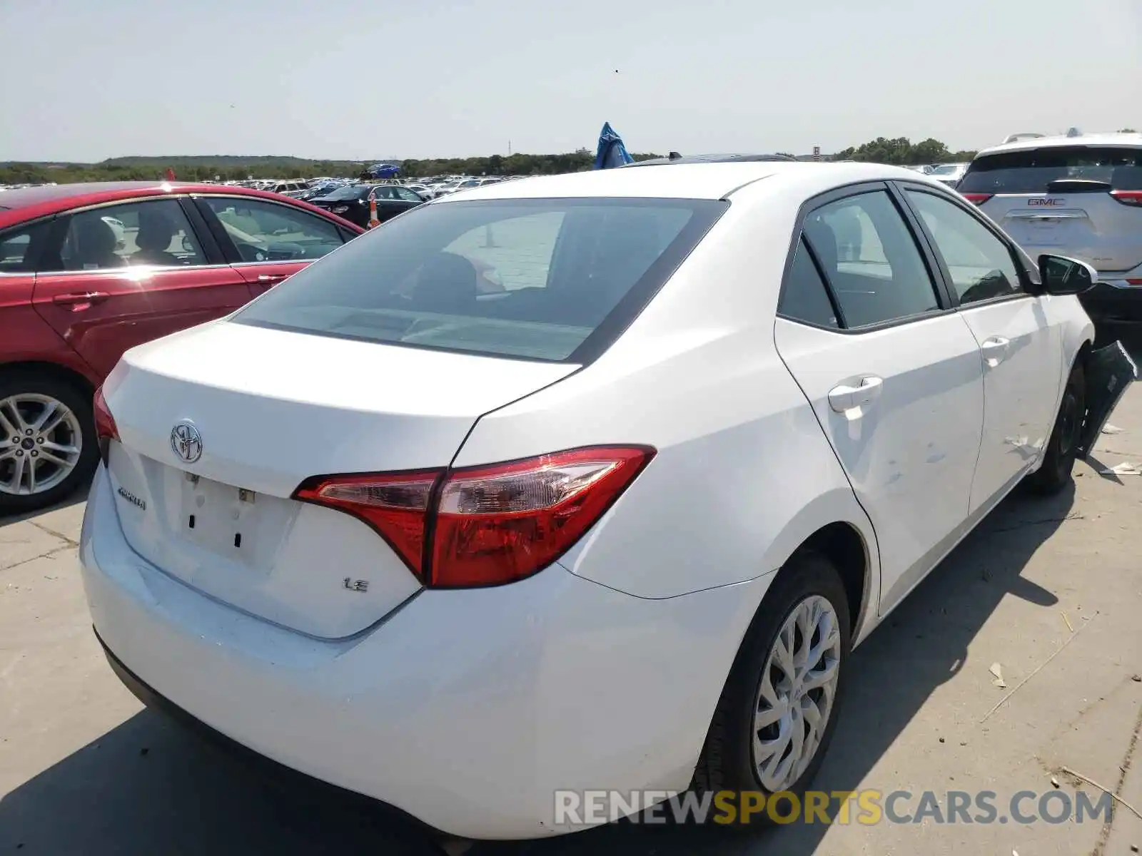 4 Photograph of a damaged car 5YFBURHE5KP885256 TOYOTA COROLLA 2019