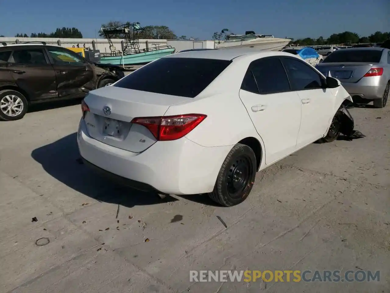 4 Photograph of a damaged car 5YFBURHE5KP893051 TOYOTA COROLLA 2019