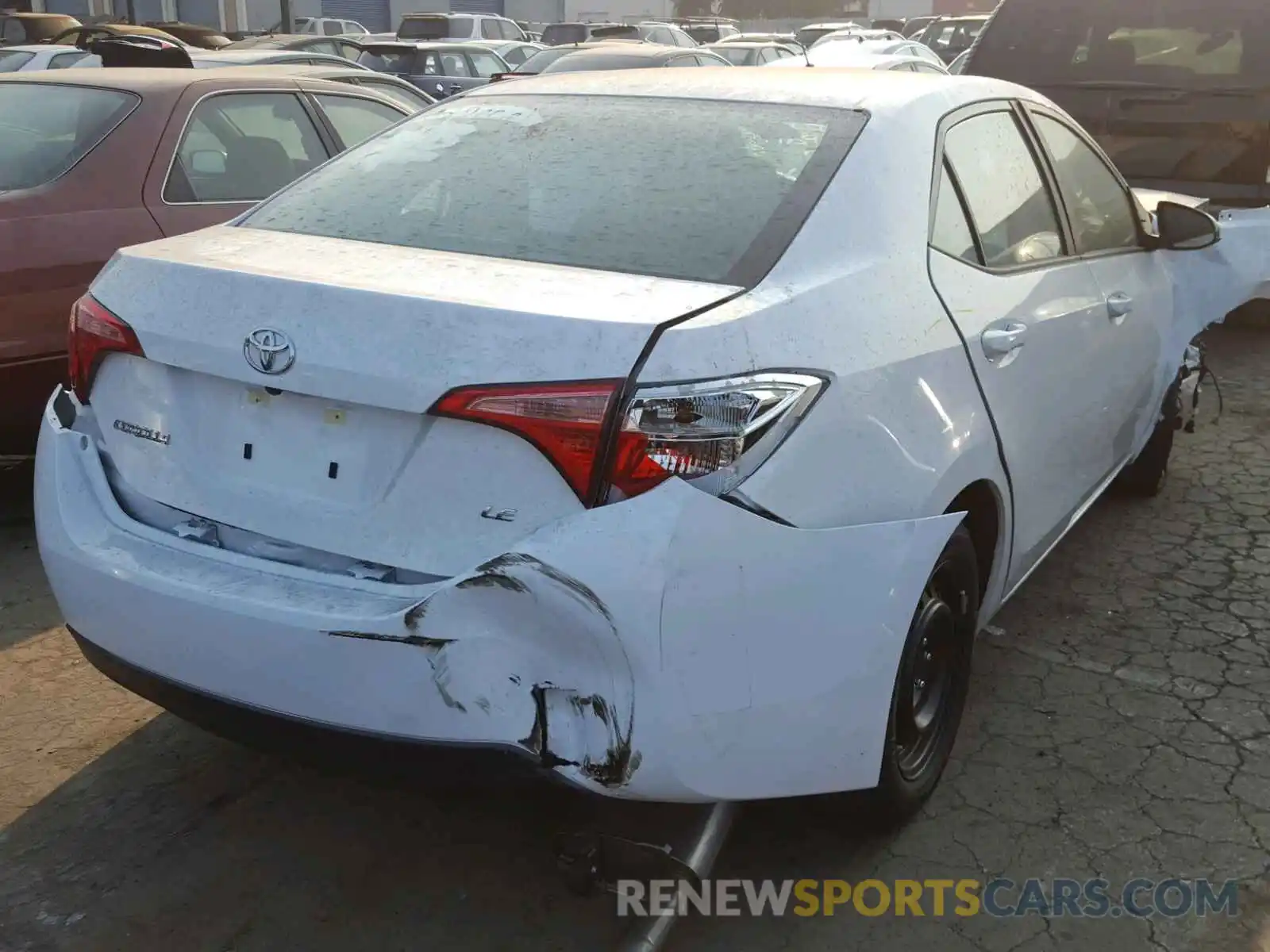 4 Photograph of a damaged car 5YFBURHE5KP898797 TOYOTA COROLLA 2019